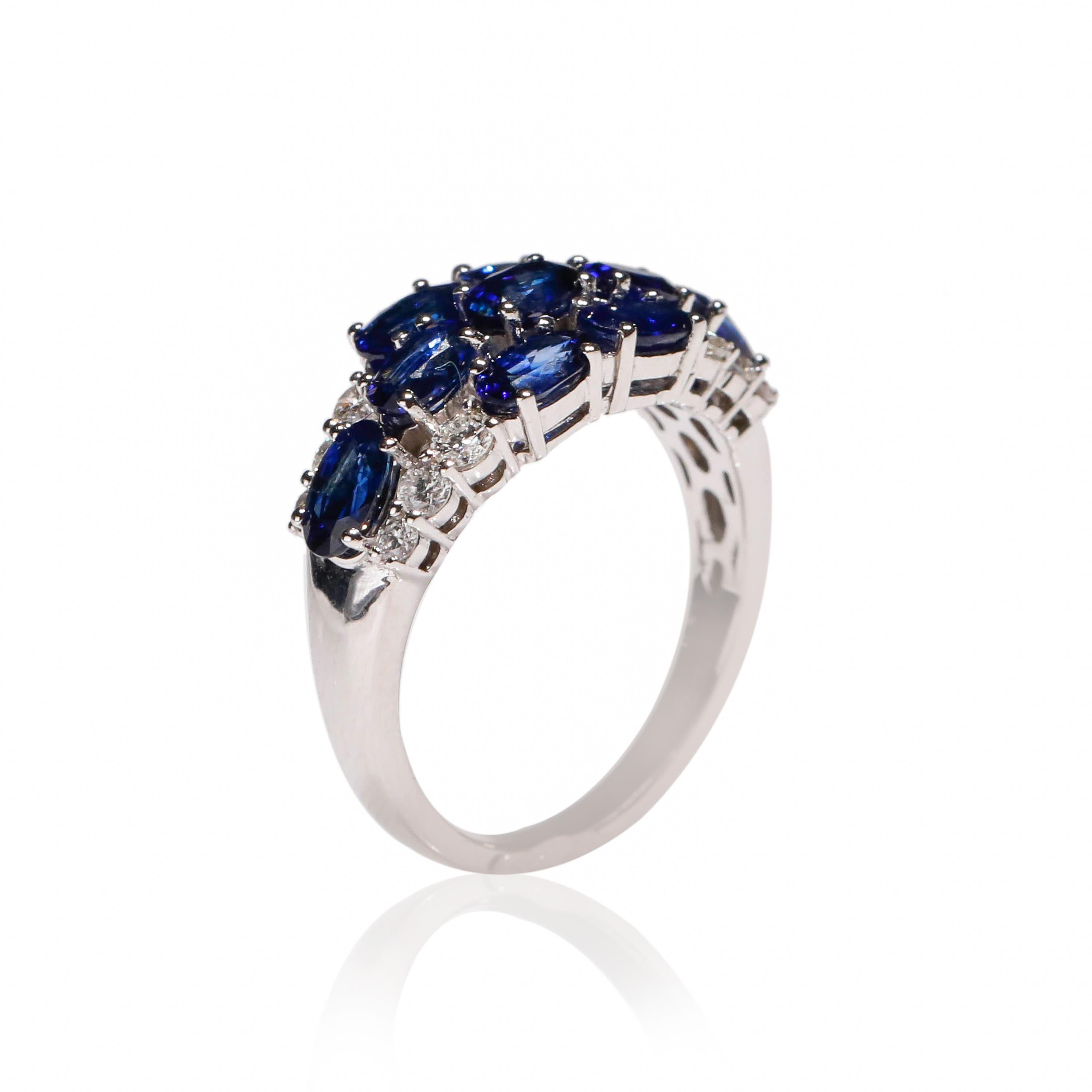 Art Deco 18 Kt White Gold Oval Cut 2.7 Ct Blue Sapphire 0.44 Ct Diamond Floral Band Ring