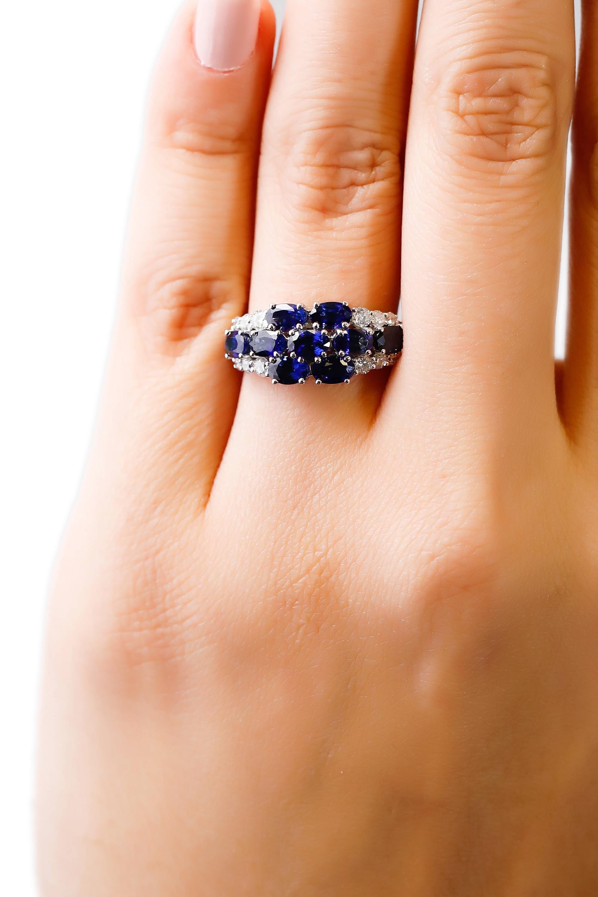 Round Cut 18 Kt White Gold Oval Cut 2.7 Ct Blue Sapphire 0.44 Ct Diamond Floral Band Ring
