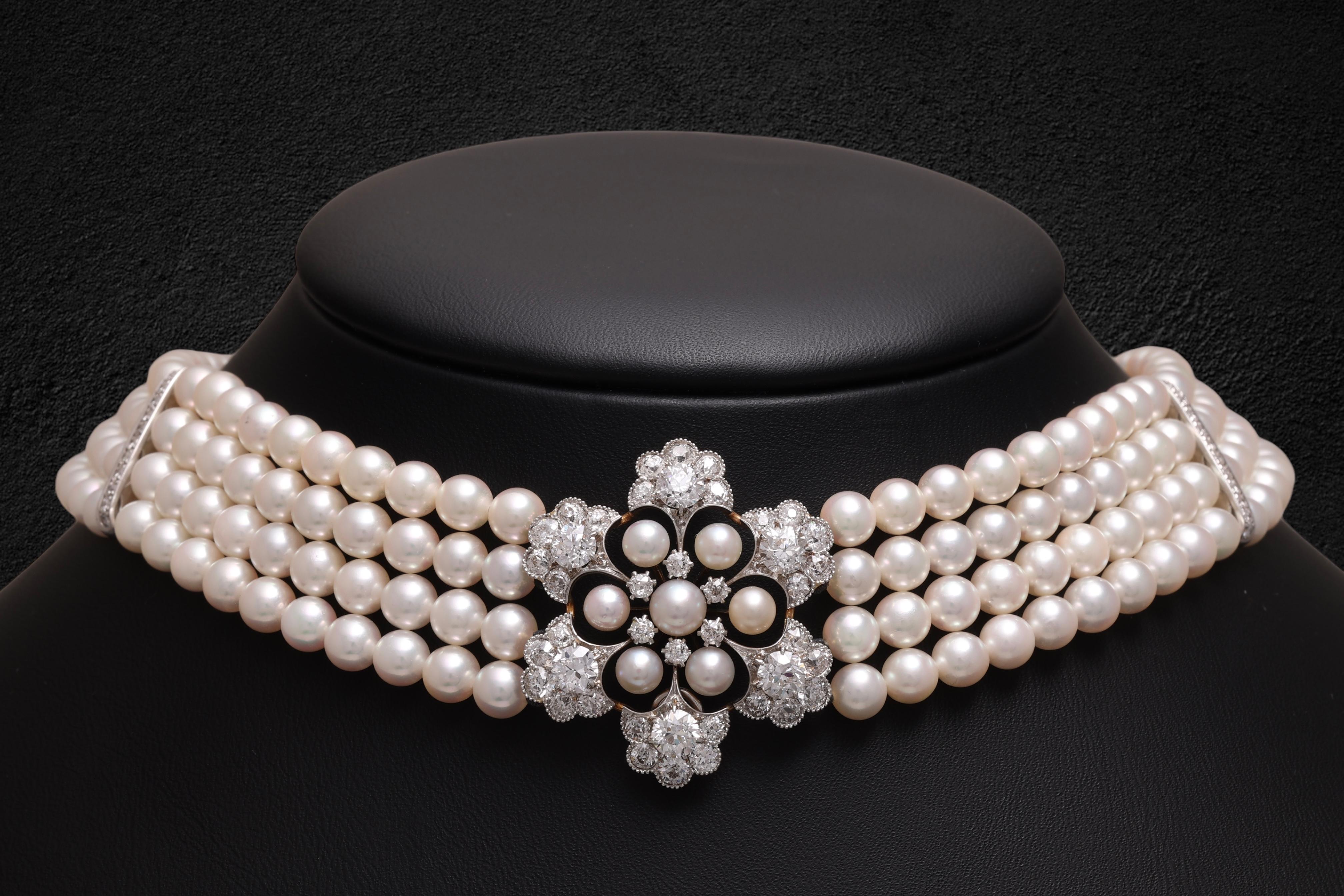 18 kt. White Gold Adler Genève 4 Strand Pearl Necklace / Choker  With Gorgeous Diamonds Pendant  from Estate Sultan Of Oman Qaboos Bin Said

Diamonds: 6 Ct

Material: 18 kt. white gold

Measurements: necklace is 35 cm long height: 33mm width:8.3mm (