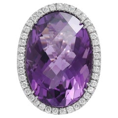 Anello in oro bianco 18 Kt con ametista, zaffiro e diamante