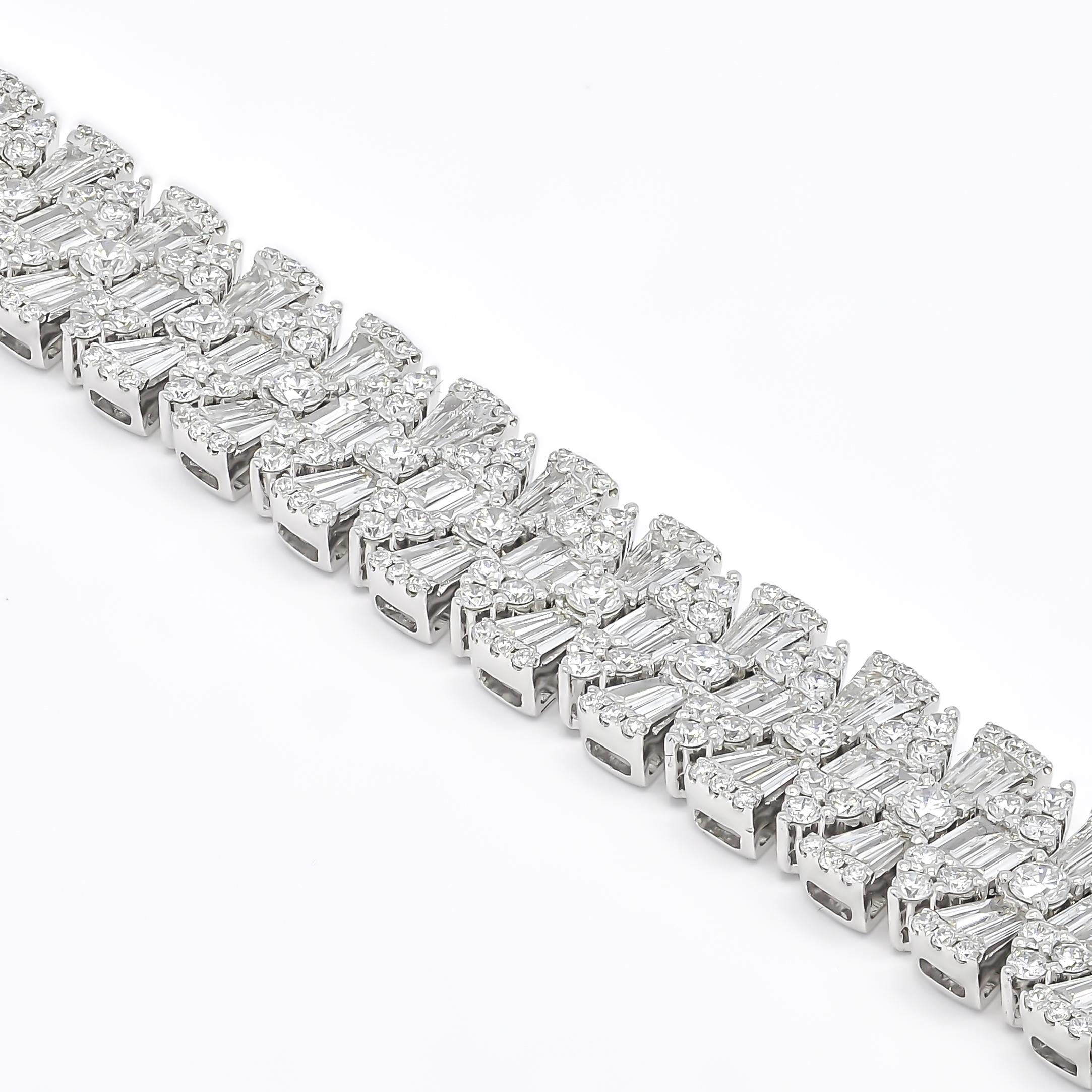 A chic row of channel set baguette diamonds flanked by classic round brilliant diamonds,
Make sparkle a priority with this glamorous diamond tennis bracelet.

Artfully set in 18k white gold, this exquisite bracelet features the soft shimmer of