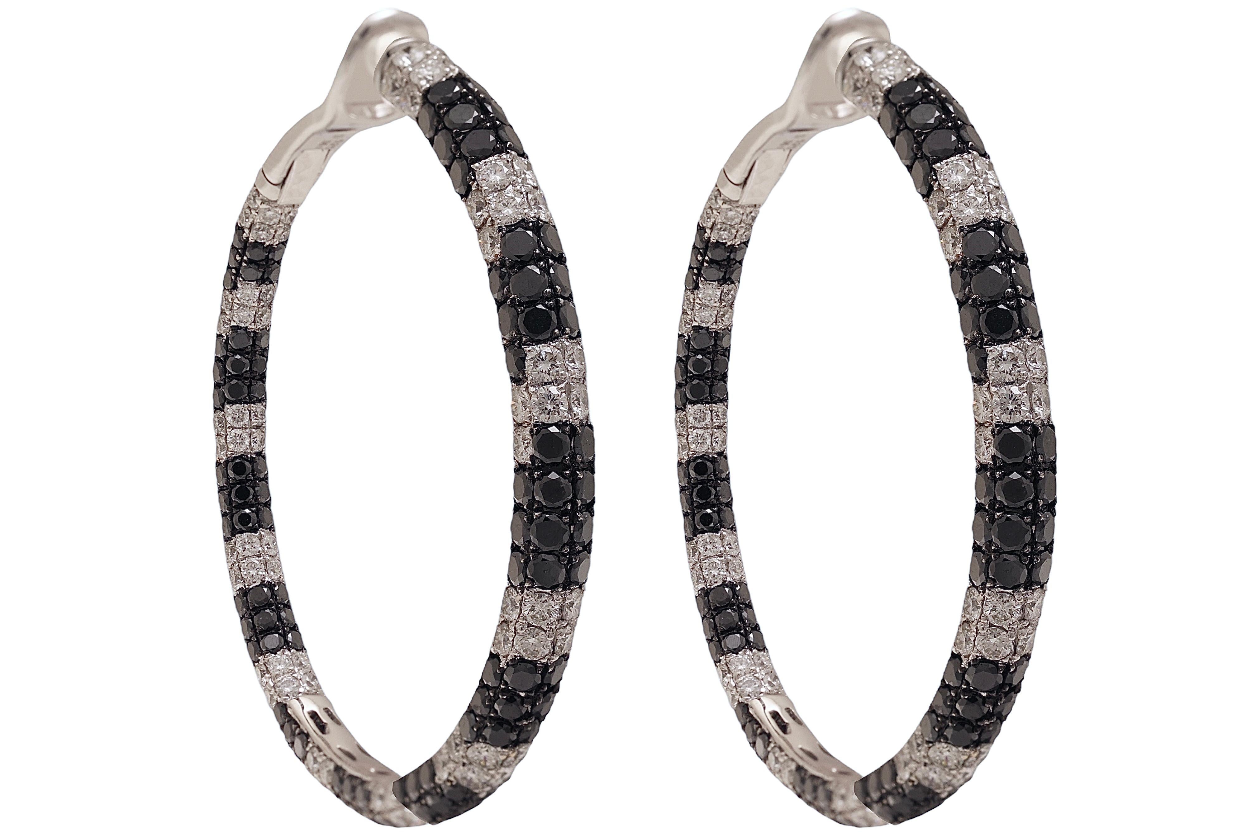 18 Kt White Gold Black & White 3,79 Ct Diamonds Hoop Earrings

Amazing Big Class Hoop Earrings which will make you shine from far !

Diamonds : Black & White 3.79 Ct Beautiful Quality

Measurements: diameter: 43.9 mm 

Total weight: 17.4 gram 0.615