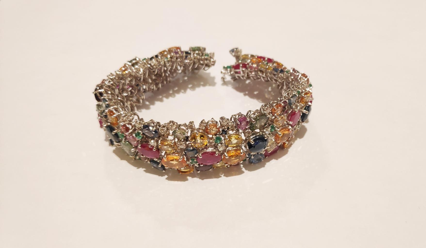 Post-War 18 Kt Gold Bracelet Multicolored Sapphires, Emeralds, Rubies and Diamonds For Sale