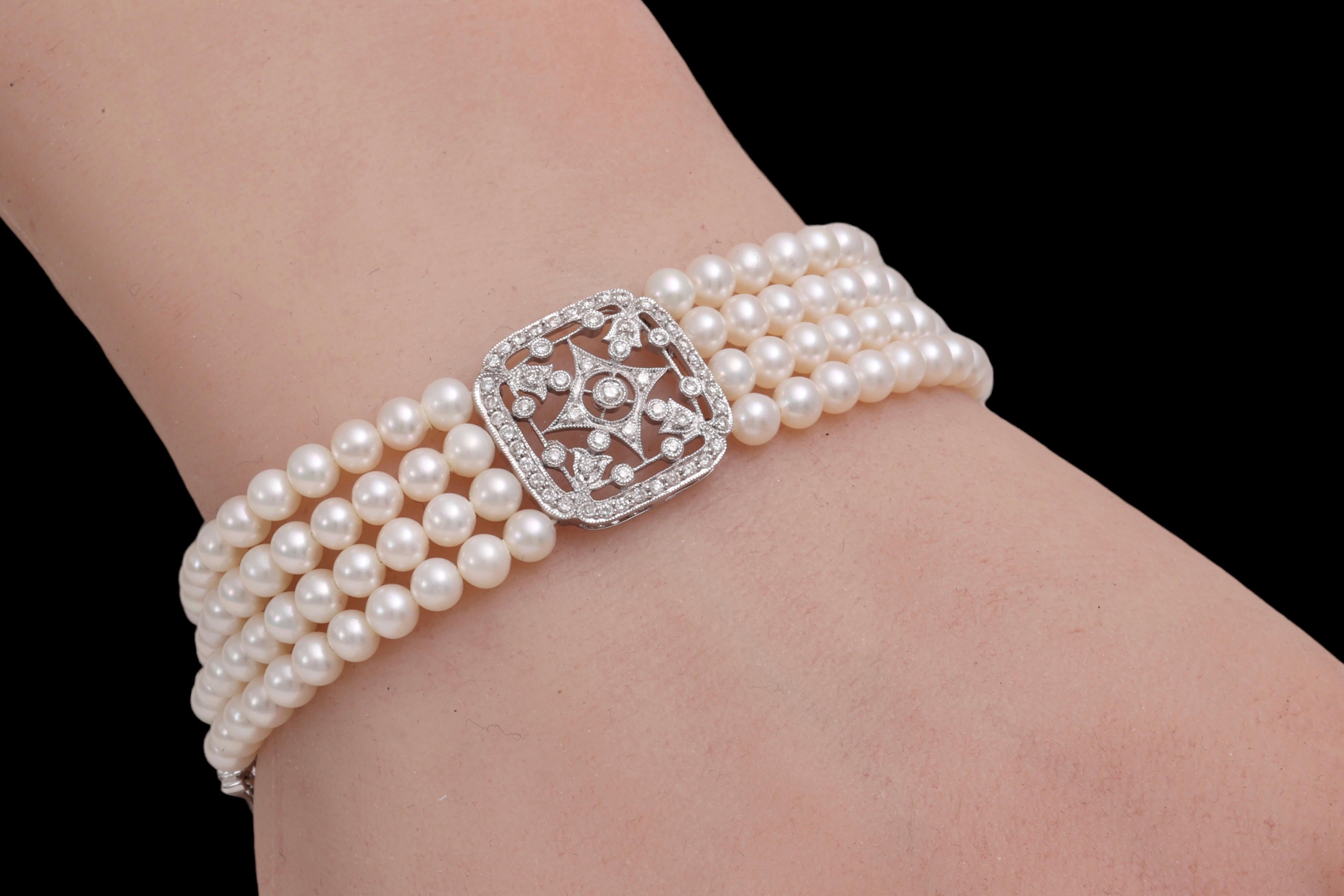 Brilliant Cut 18 kt. White Gold Bracelet with 4 Rows of Pearls and 1.06 ct. Diamonds For Sale