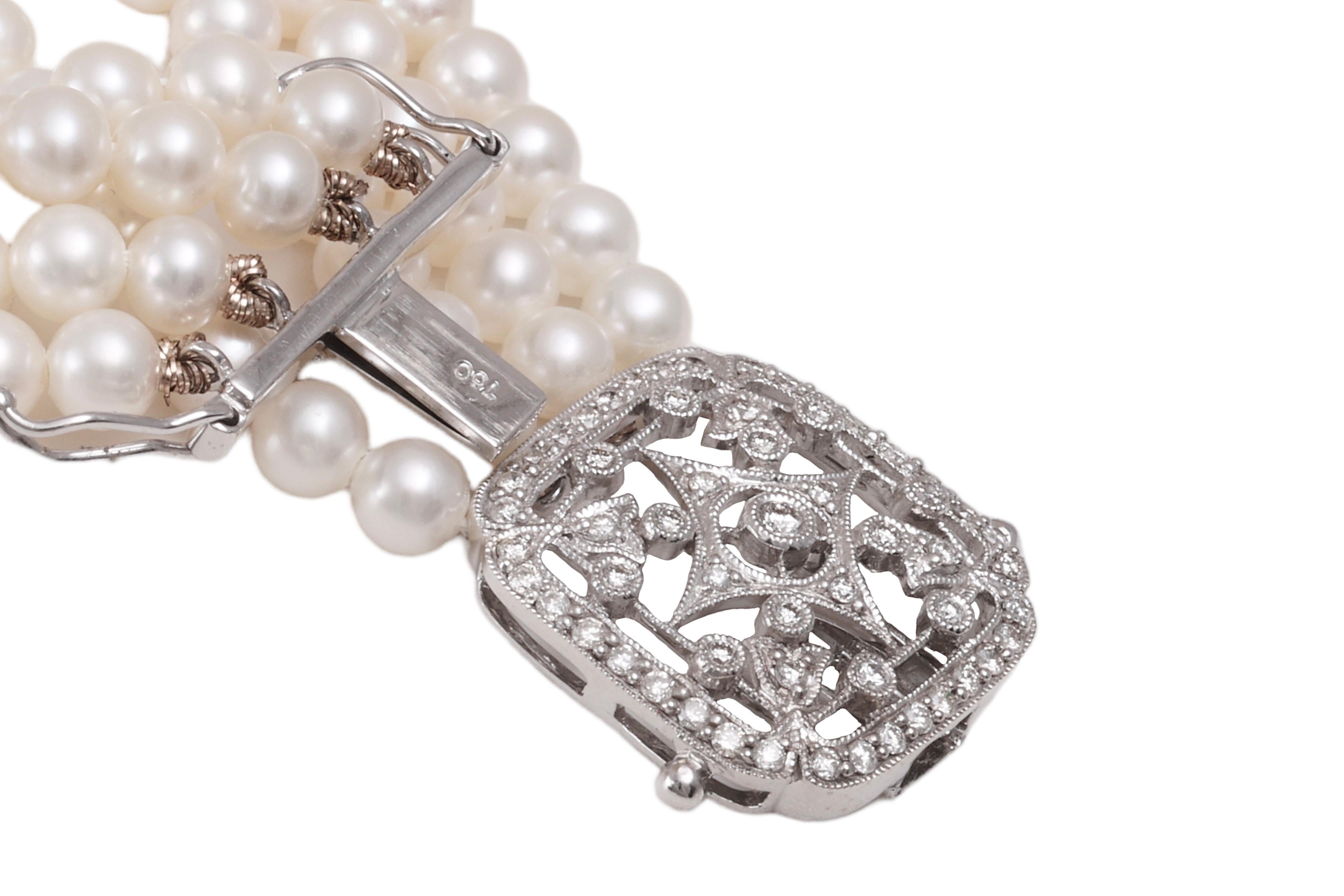 Women's or Men's 18 kt. White Gold Bracelet with 4 Rows of Pearls and 1.06 ct. Diamonds For Sale