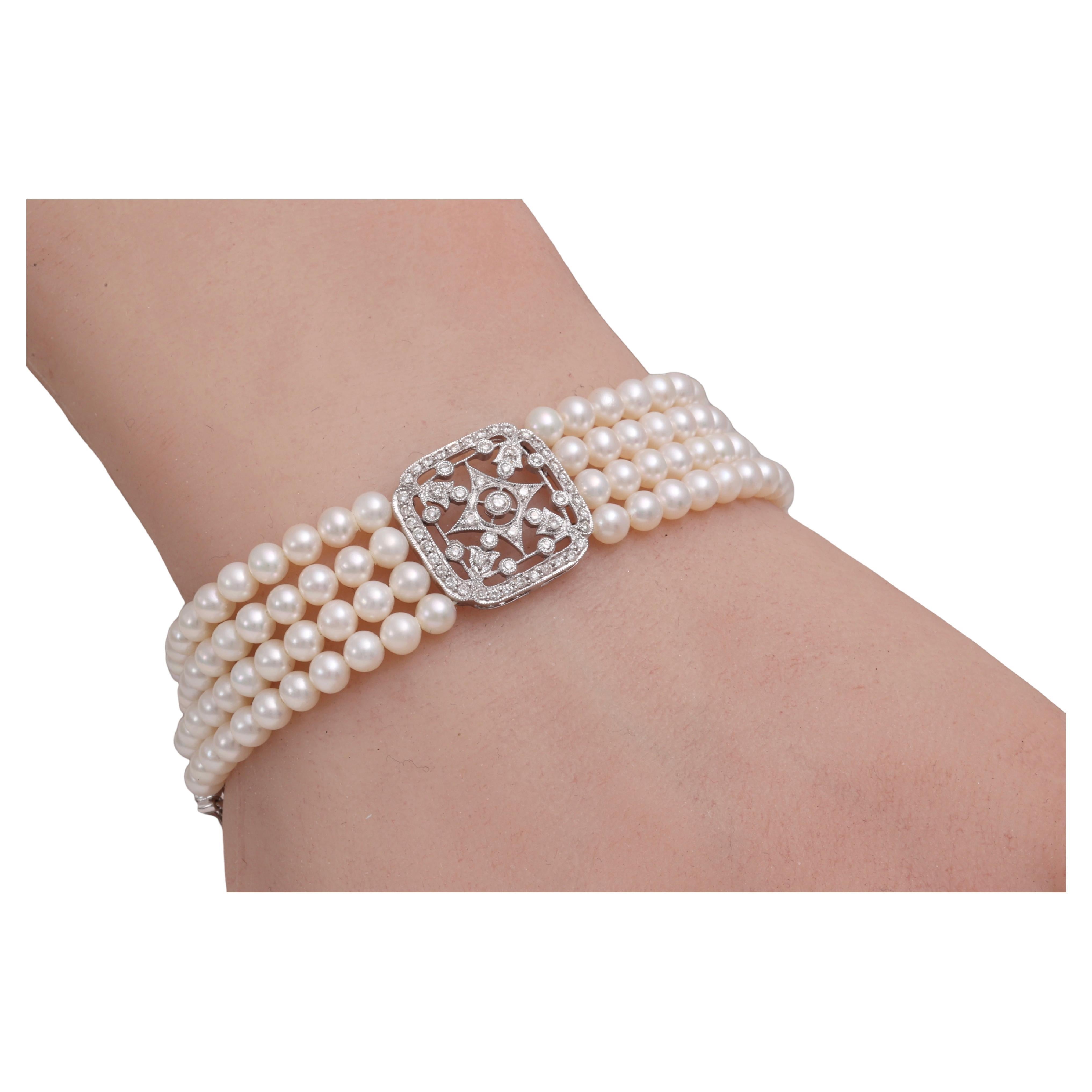 18 kt. White Gold Bracelet with 4 Rows of Pearls and 1.06 ct. Diamonds For Sale