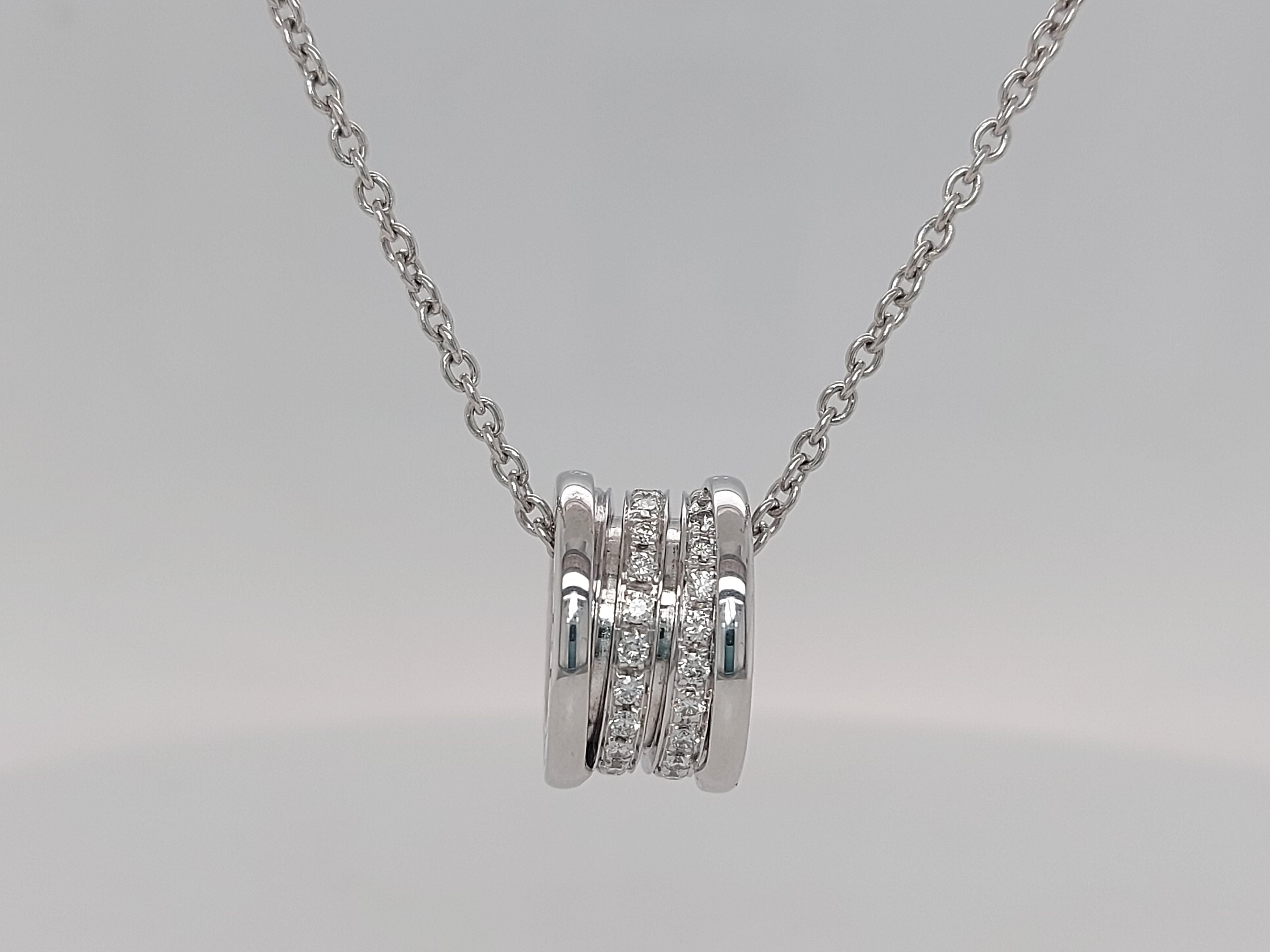 18Kt White Gold Bvlgari B-zero1 Necklace With Pave Diamonds 

The Bvlgari icon B-ZERO1 series inspired by the world's most famous amphitheater Colosseum.
This is a luxury model that combines white gold and diamonds.
The elegant radiance shines on