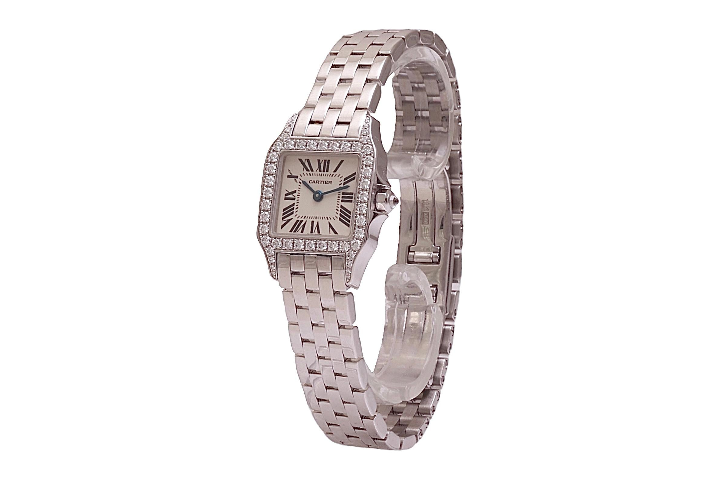 18 kt. White Gold Cartier Santos Demoiselle Ladies Wristwatch With Box and Papers in Top Condition

Watch comes with Cartier box and papers

Model: Santos Demoiselle

Movement: Quartz

Case: 18 kt. white gold Square Case 20 mm x 20 mm, Bezel set