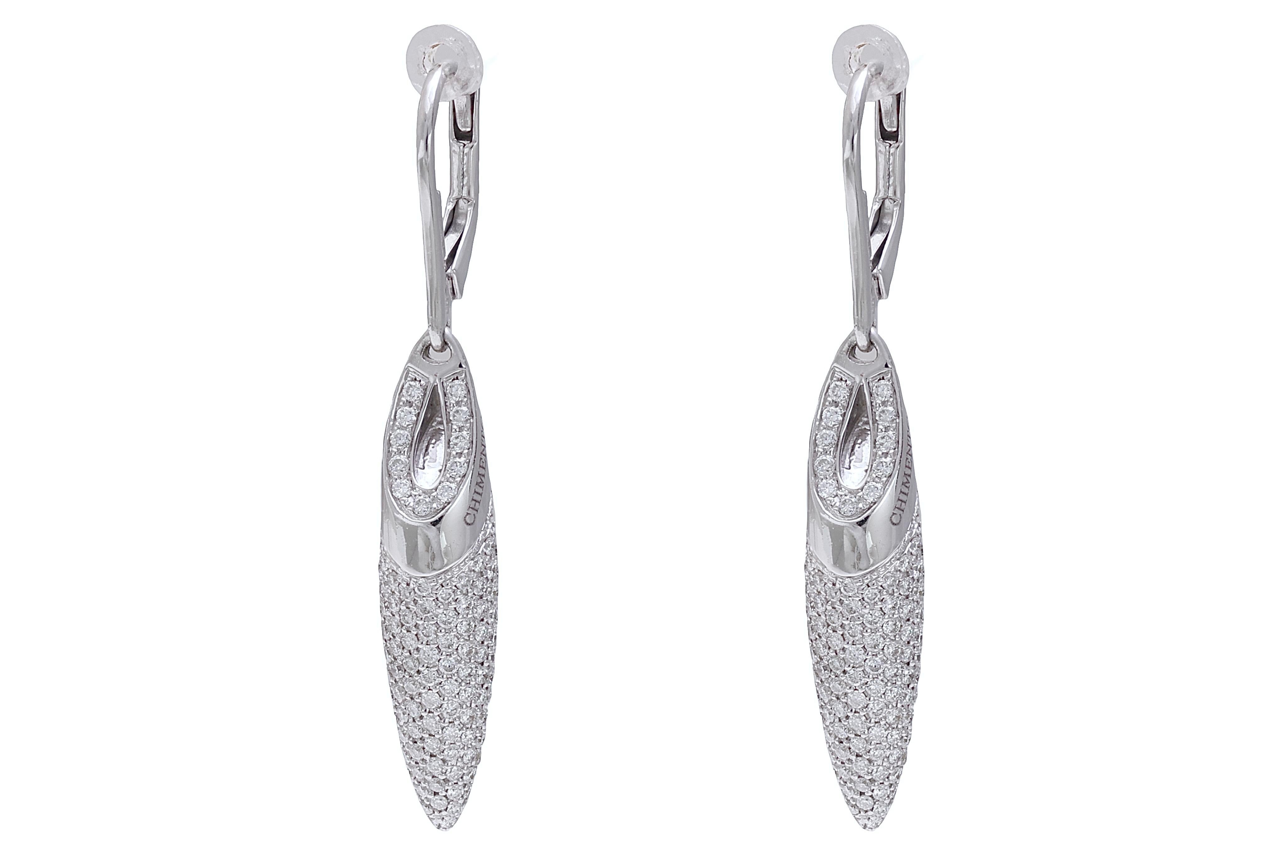Gorgeous 18 kt. White Gold Chimento Dangle Earrings With 2.6 ct. Diamond

Diamonds: brilliant cut diamonds, together 2.6 ct.

Material: 18 kt. white gold

Measurements: 41.2 mm x 6.2 mm x 6.4 mm

Total weight: 9.8 gram / 0.345 oz / 6.3 dwt