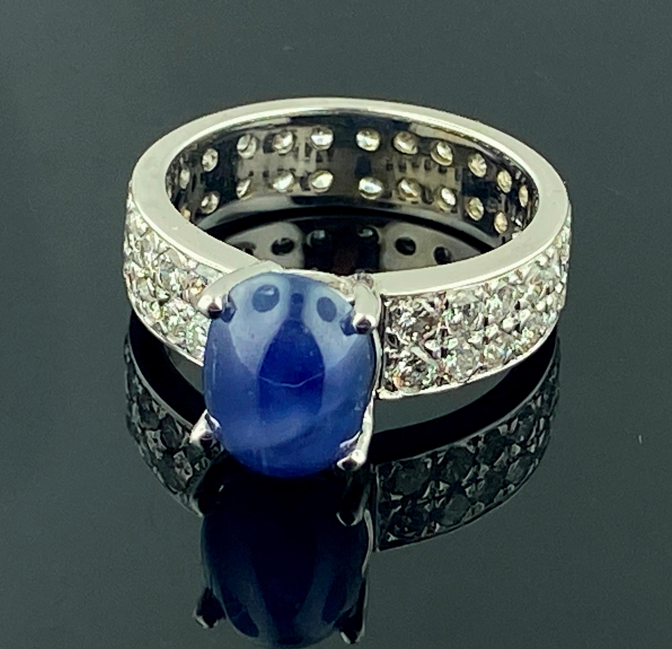 Round Cut 18 Karat White Gold Diamond and Blue Star Sapphire Ring
