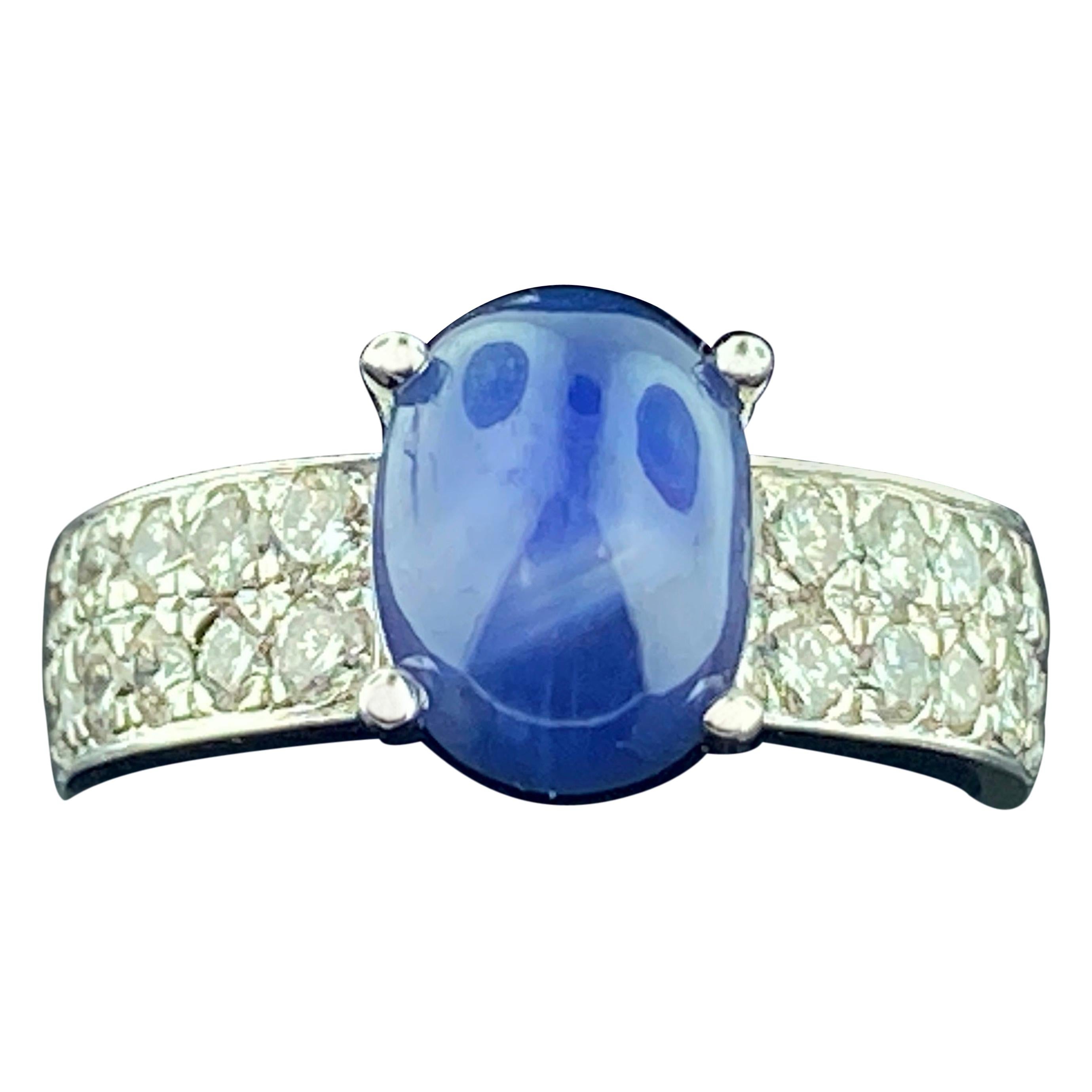 18 Karat White Gold Diamond and Blue Star Sapphire Ring