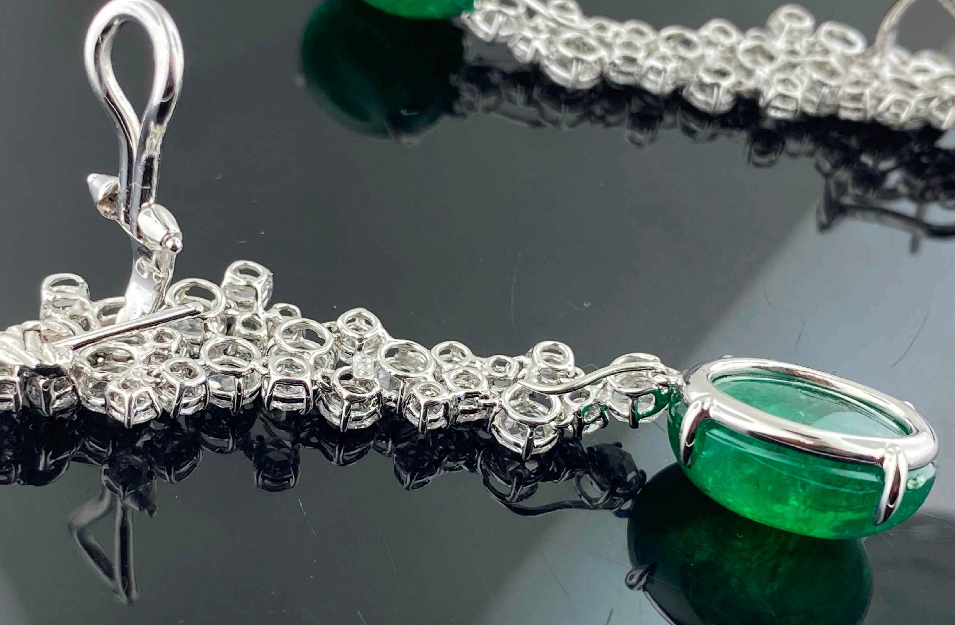 Oval Cut 18 Karat White Gold Diamond and Emerald Drop Earrings For Sale