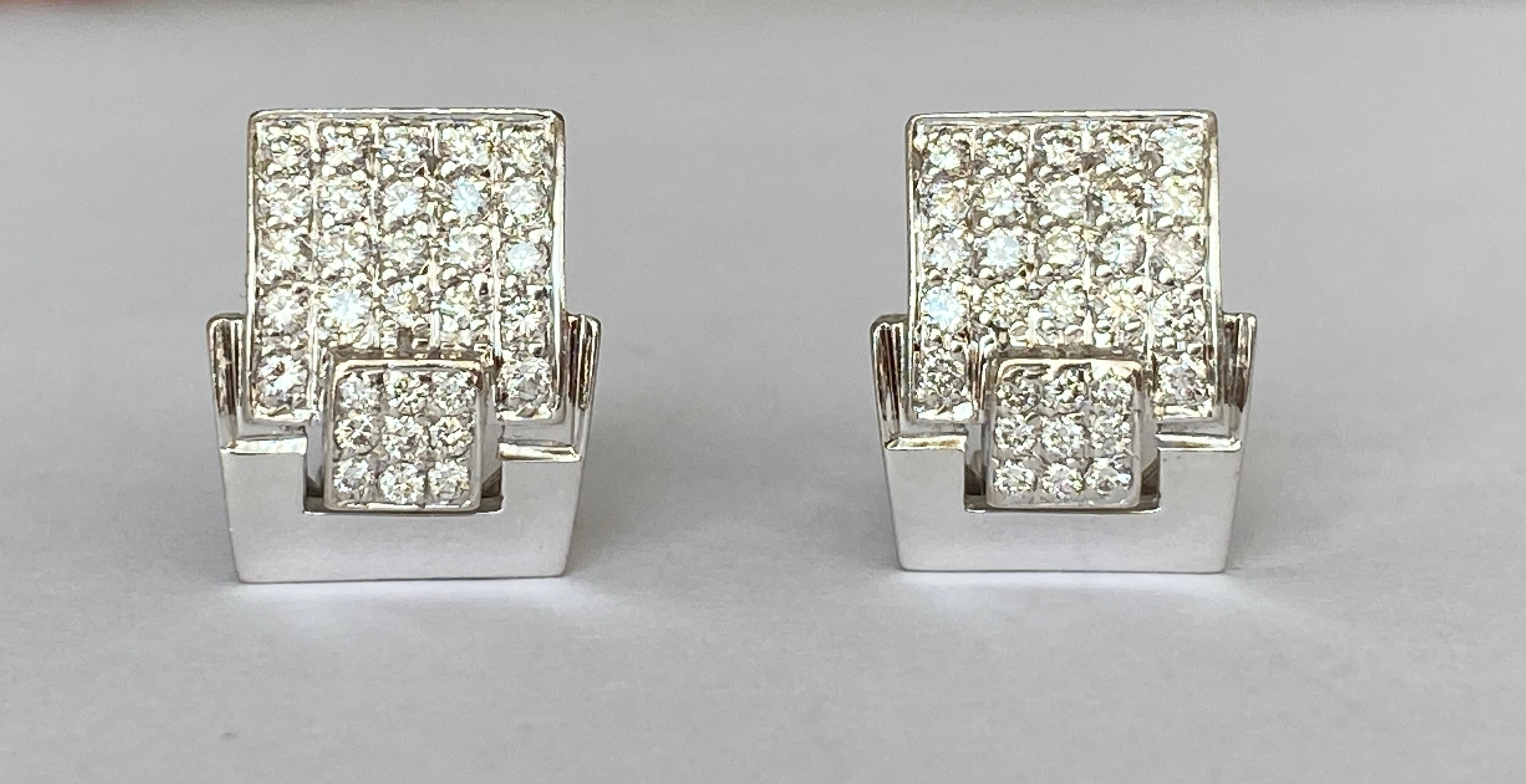 Offered in good condition, design 18 kt ear studs on the front set with 62 brilliant cut diamonds of 1.18 ct of quality G/VS/SI. 
Gold content: 18 kt (hallmarked)  
18 brilliant cut diamonds: 0.30 ct G/VS/SI  
44 brilliant cut diamonds: 0.88 ct