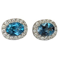 18 kt white gold Diamond earrings studs with 2.6 ct London Blue Topaz