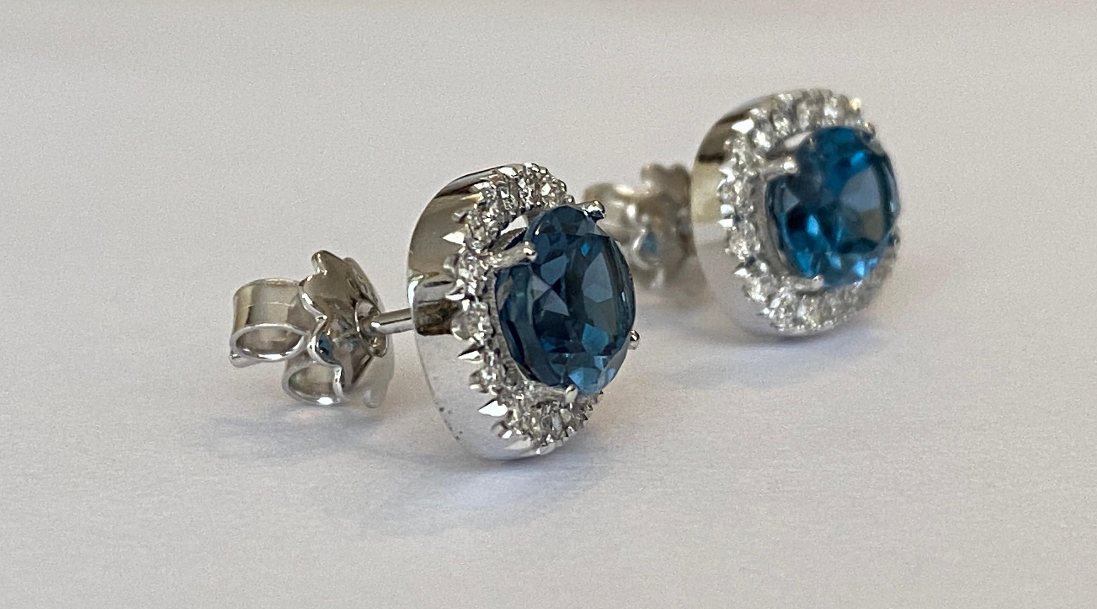 18 kt white gold Diamond earrings studs with London Blue Topaz For Sale 4