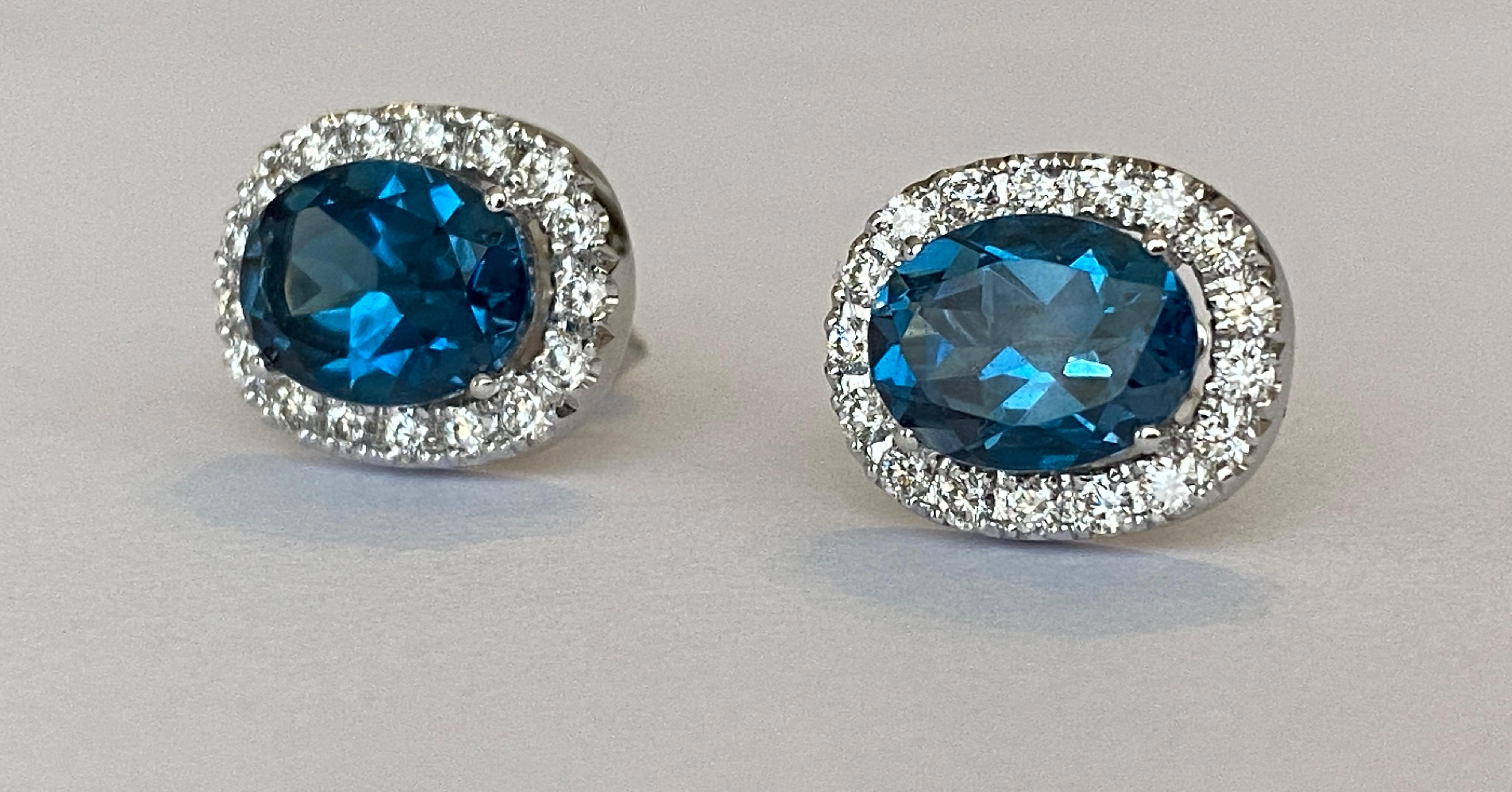Brilliant Cut 18 kt white gold Diamond earrings studs with London Blue Topaz For Sale