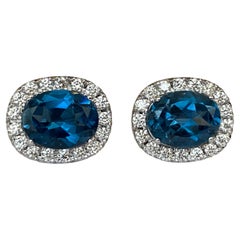 18 kt white gold Diamond earrings studs with London Blue Topaz