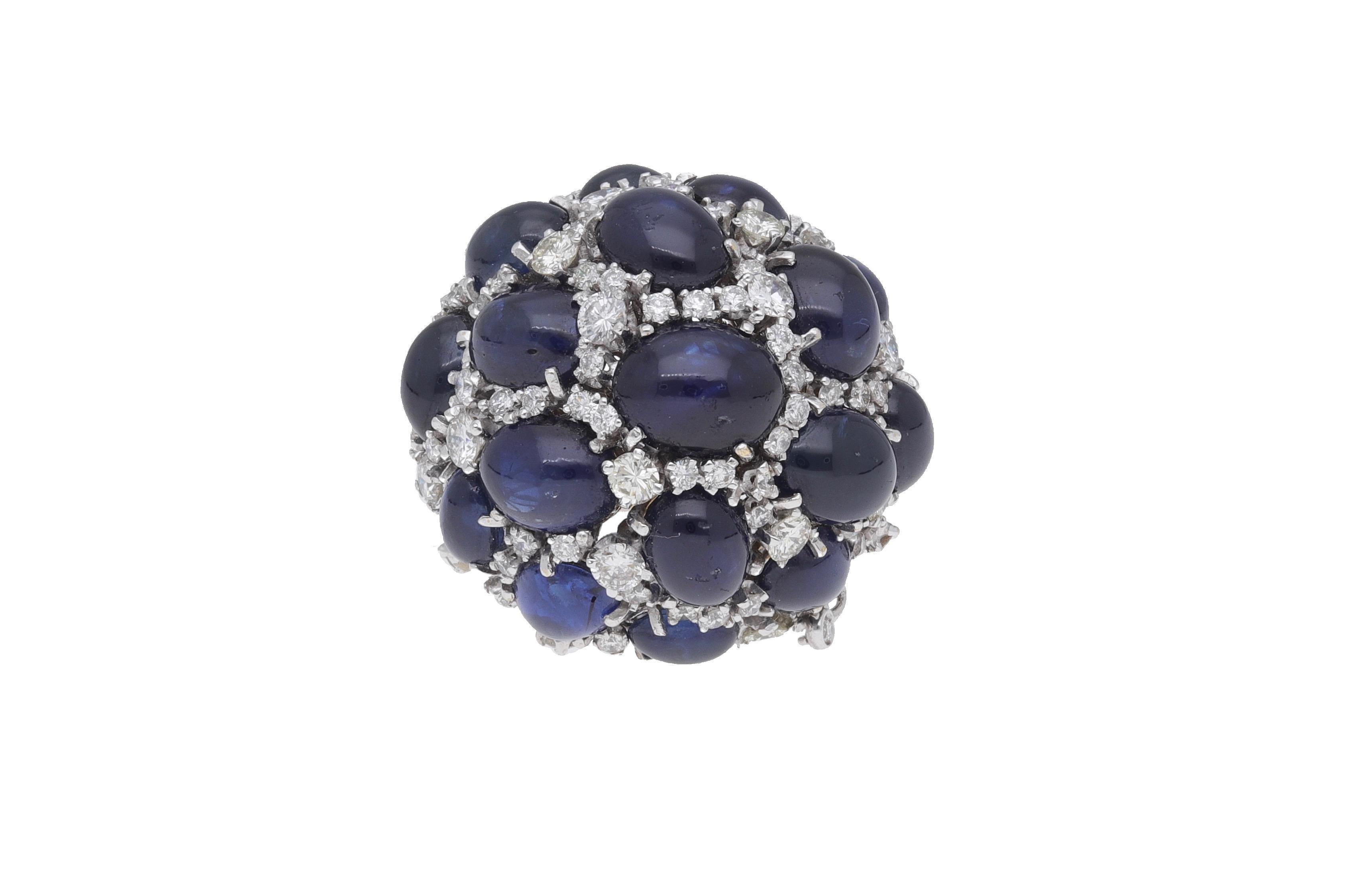 18 karat white gold cocktail ring with diamonds and cabochon blue sapphires.
Diamonds: 4.70 carat diamonds round-cut ( H-I color / VVS1 -VVS2 )
Sapphires: 32.10 carat of cabochon sapphires
Weight: gr. 36.50
Size: 6
Diameter: cm. 3.10
This stunning
