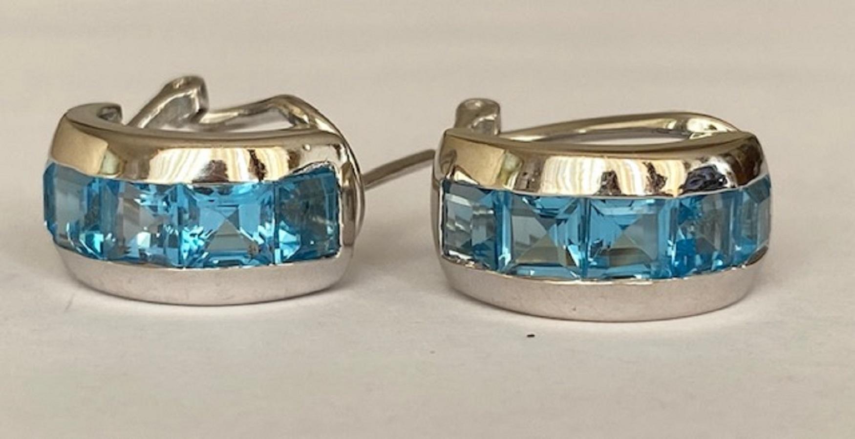 Offered in good condition: 18 kt white gold earrings with princess cut topazes of approx. 4.00 ct.
Grade: 750 (marked)
Size of the earrings is 19 mm x 7 mm
Citrine: approx. 4.00 ct (0.40 ct *10 pcs)
Weight: 7.8 grams
Comes in a jewellery  box
