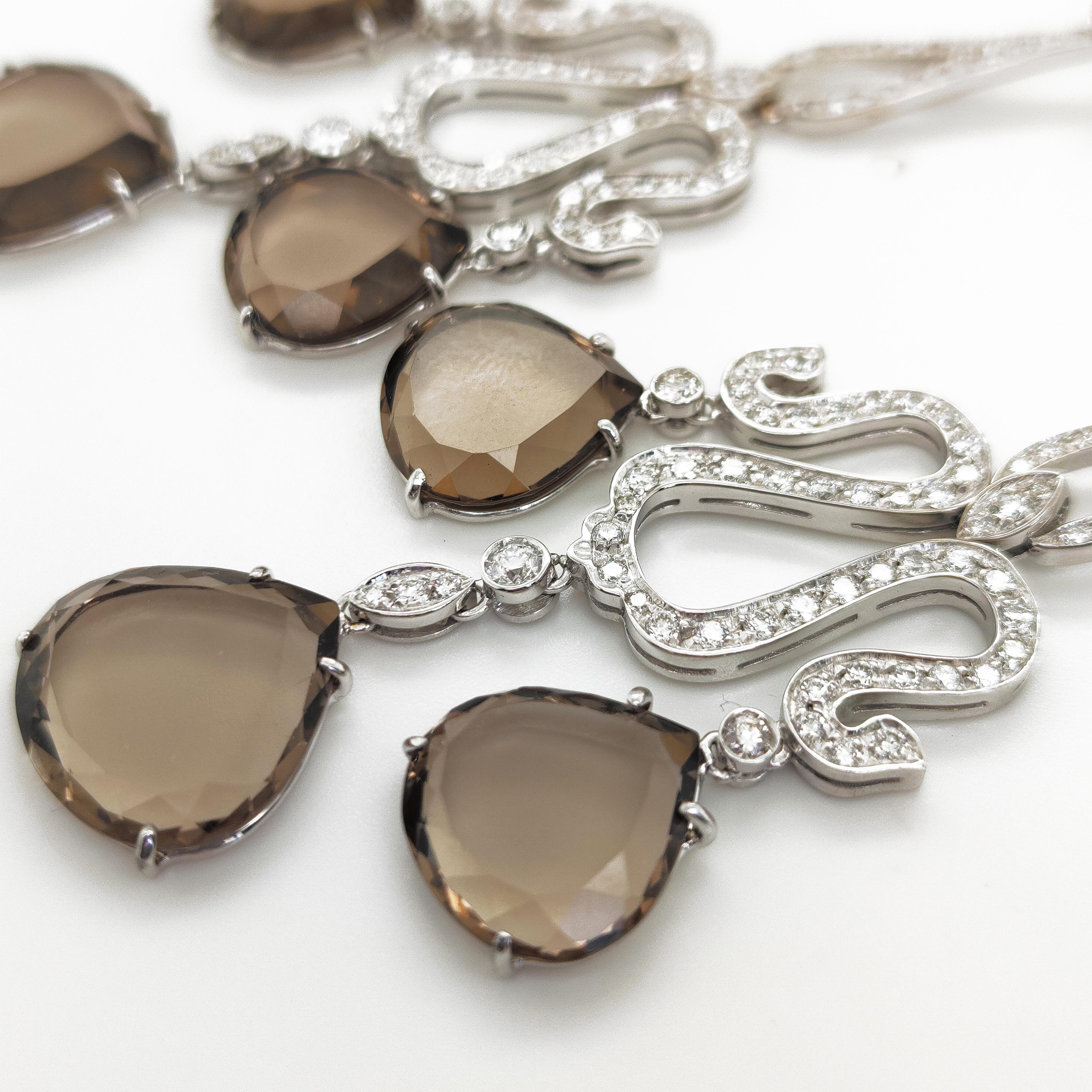 Modern 18 kt White Gold Earrings with Smoky quartz drops and 2, 70 carats of diamonds For Sale