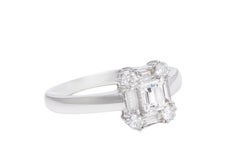 18 kt. White Gold Engagement Ring with Baguette and Brilliant Cut Diamonds