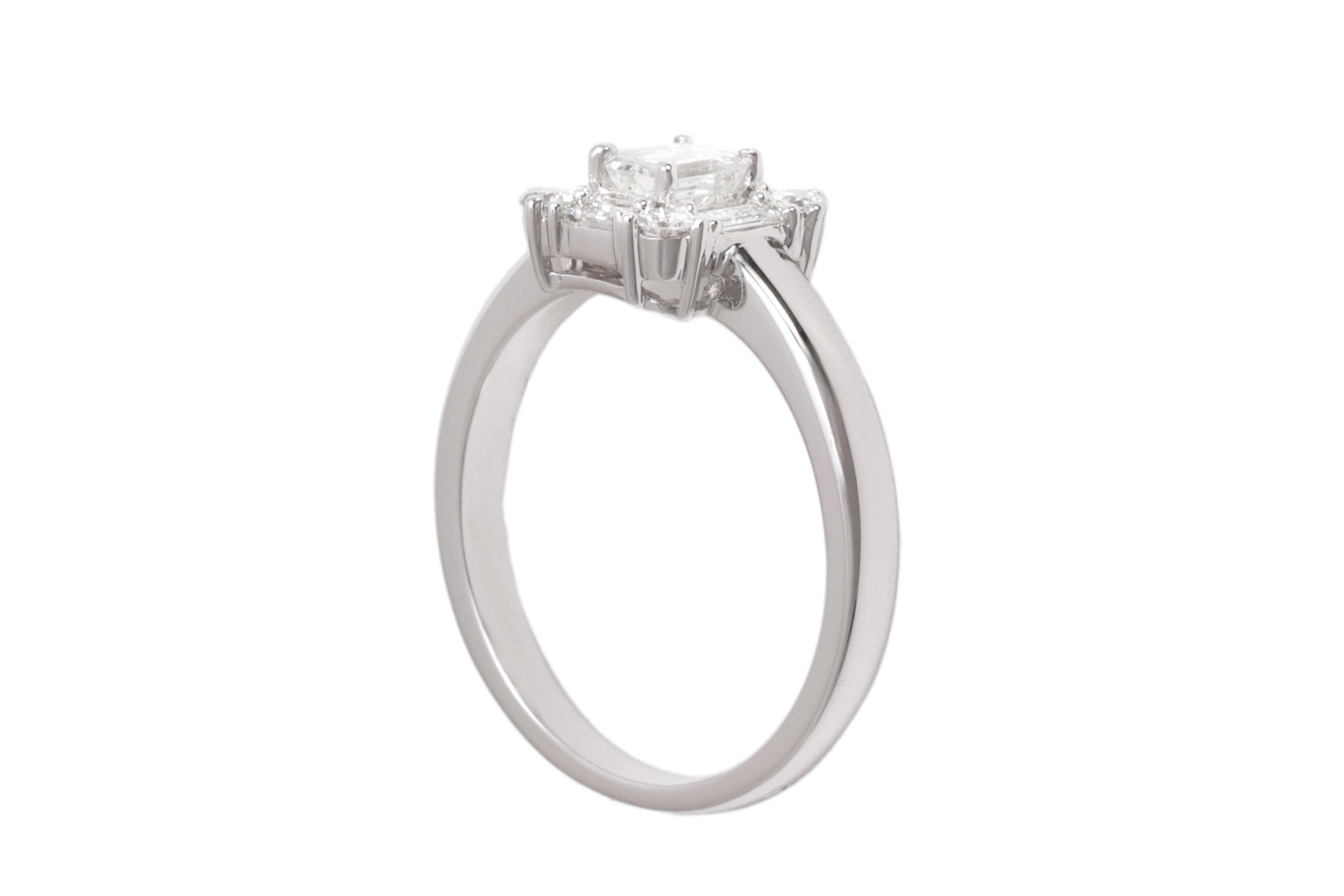 Modern 18 kt. White Gold Engagement Ring with Baguette and Brilliant Cut Diamonds   For Sale