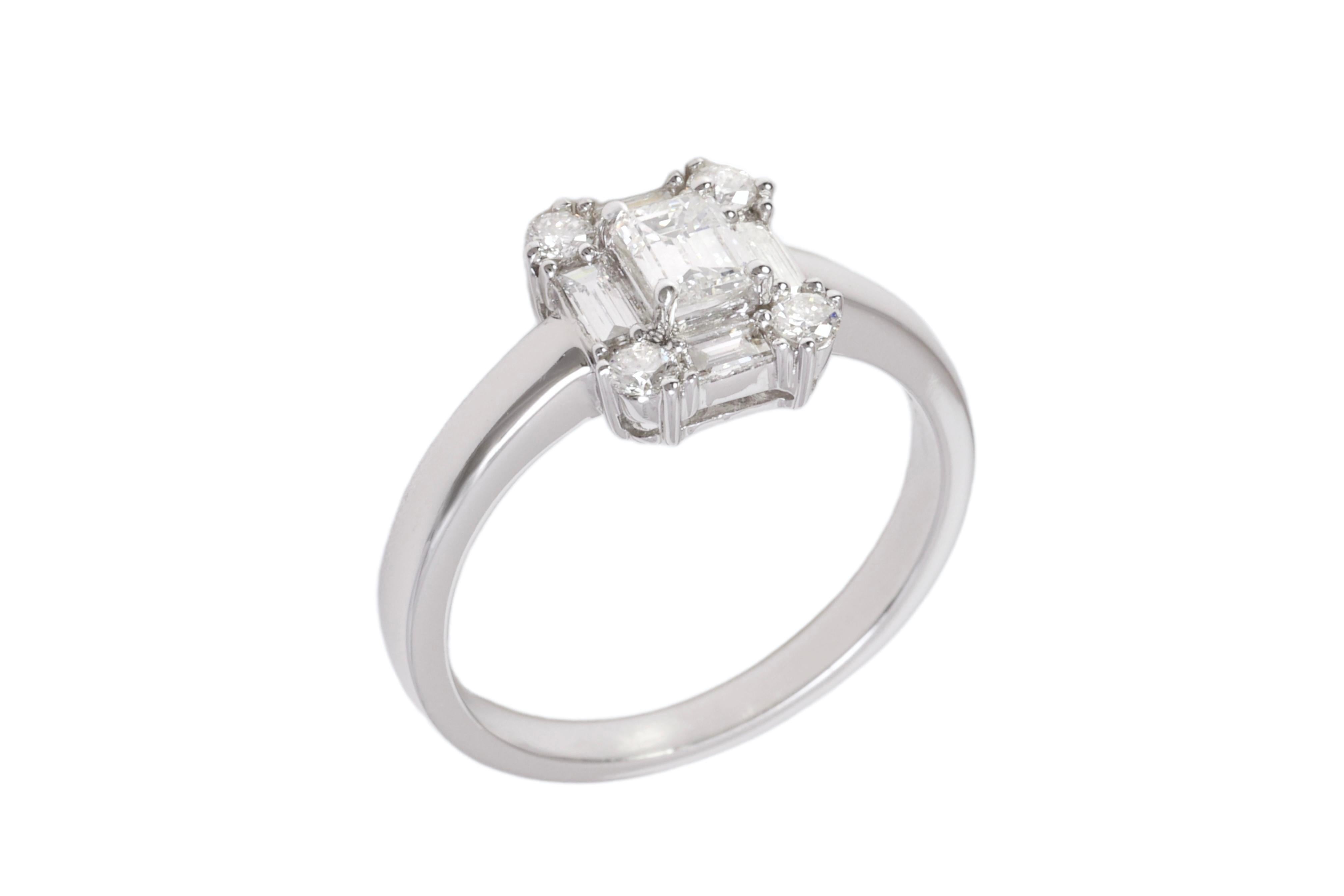 Baguette Cut 18 kt. White Gold Engagement Ring with Baguette and Brilliant Cut Diamonds   For Sale