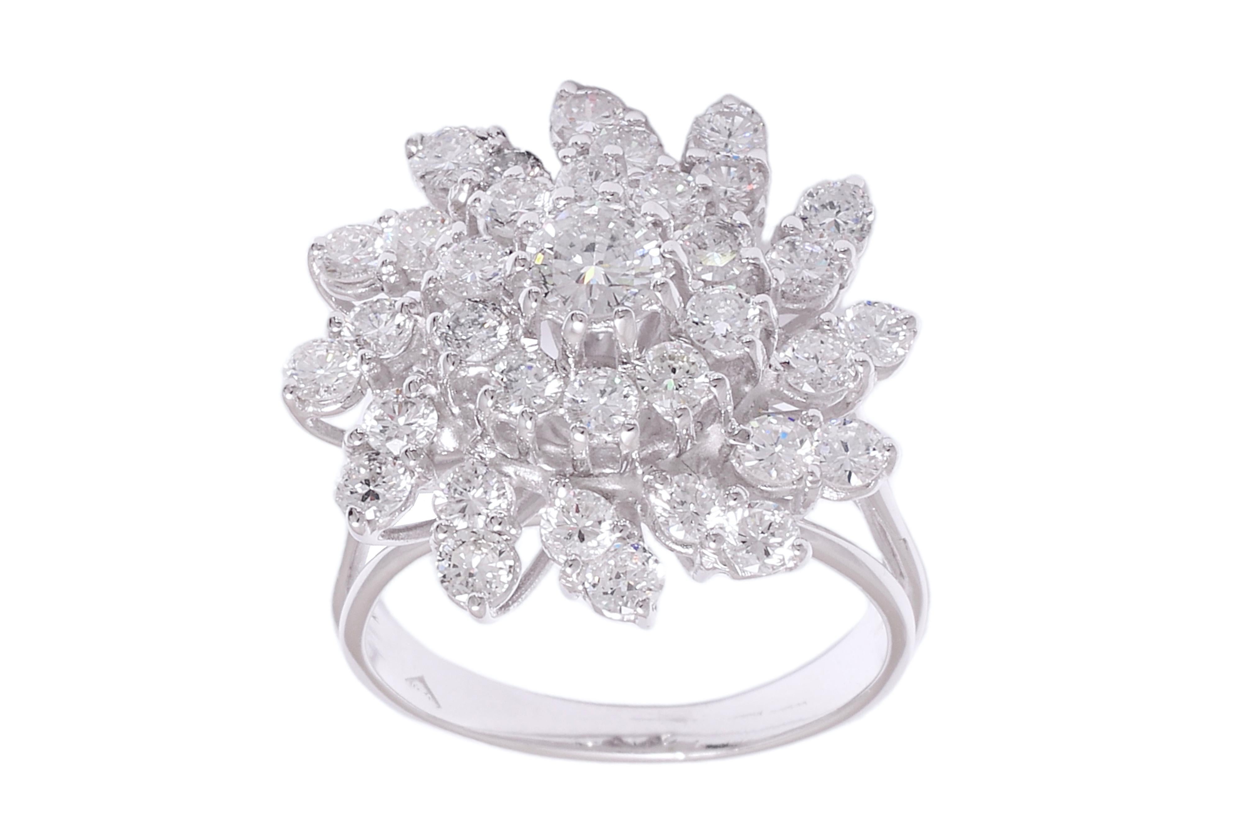 Magnificant 18 kt. White Gold Flower Ring With 2.85 ct. Diamonds 

Diamonds: brilliant cut diamonds, together  2.85 ct.

Material: 18 kt. white gold

Ring size: 53 EU / 6.5 US ( ring size can be changed for free ) 

Total weight: 7.8 grams  / 5 dwt