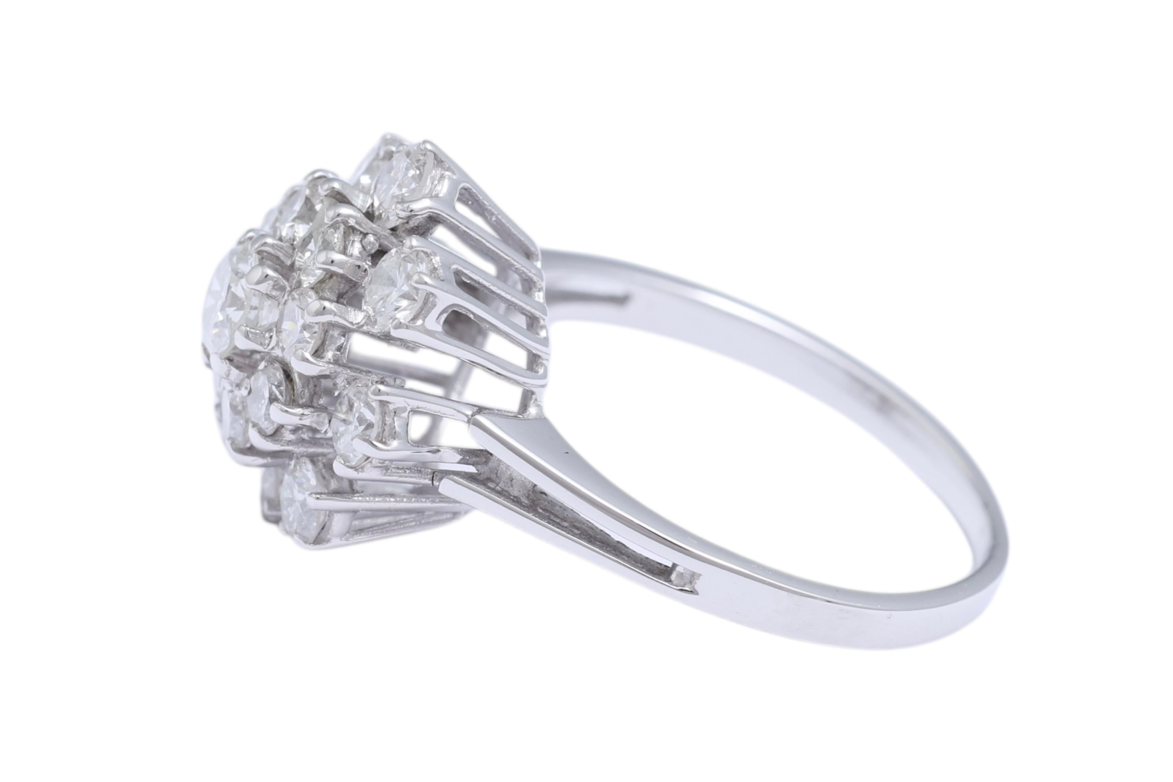 Artisan 18 Kt White Gold Flower Shaped Ring with Diamonds For Sale