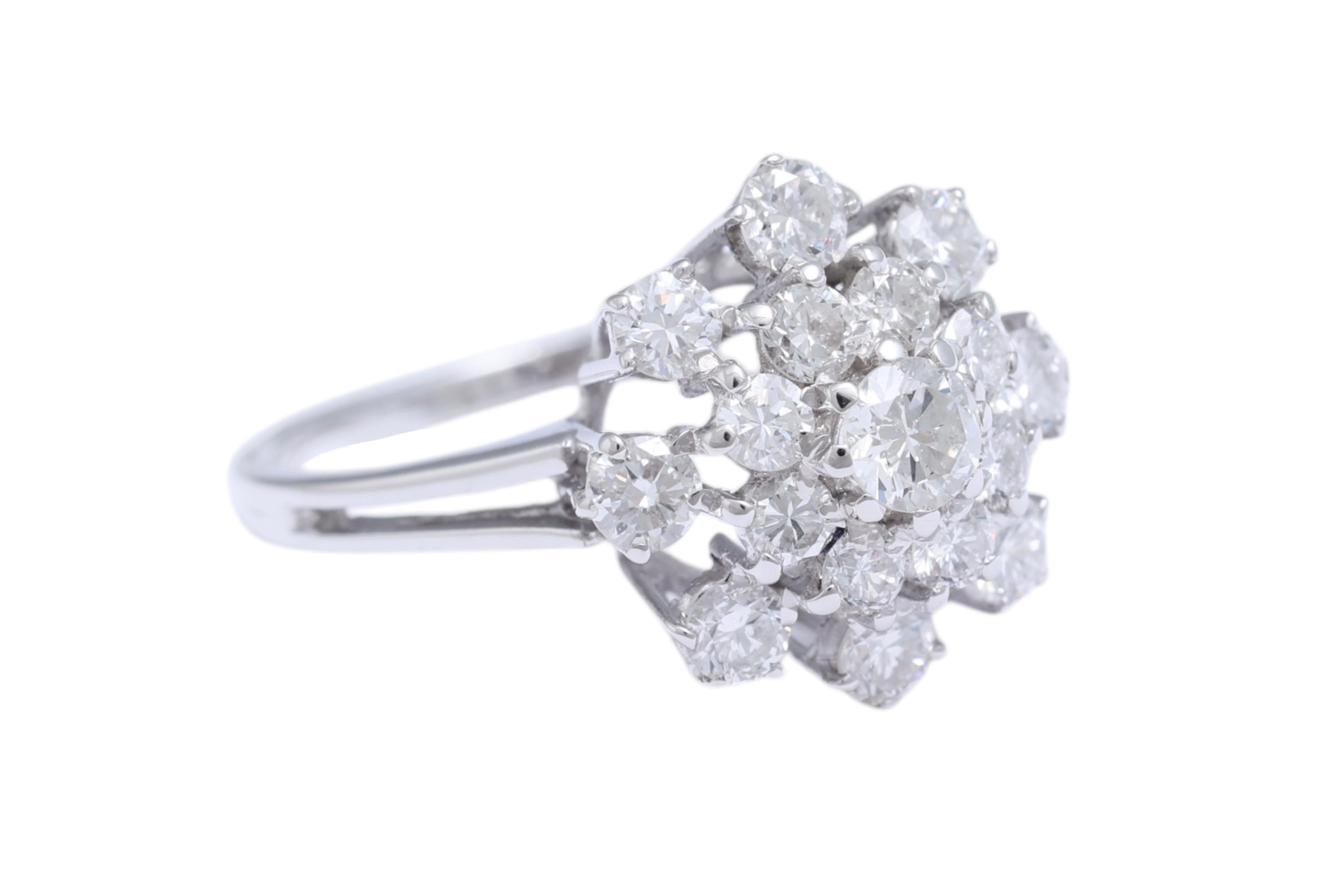 Round Cut 18 Kt White Gold Flower Shaped Ring with Diamonds For Sale