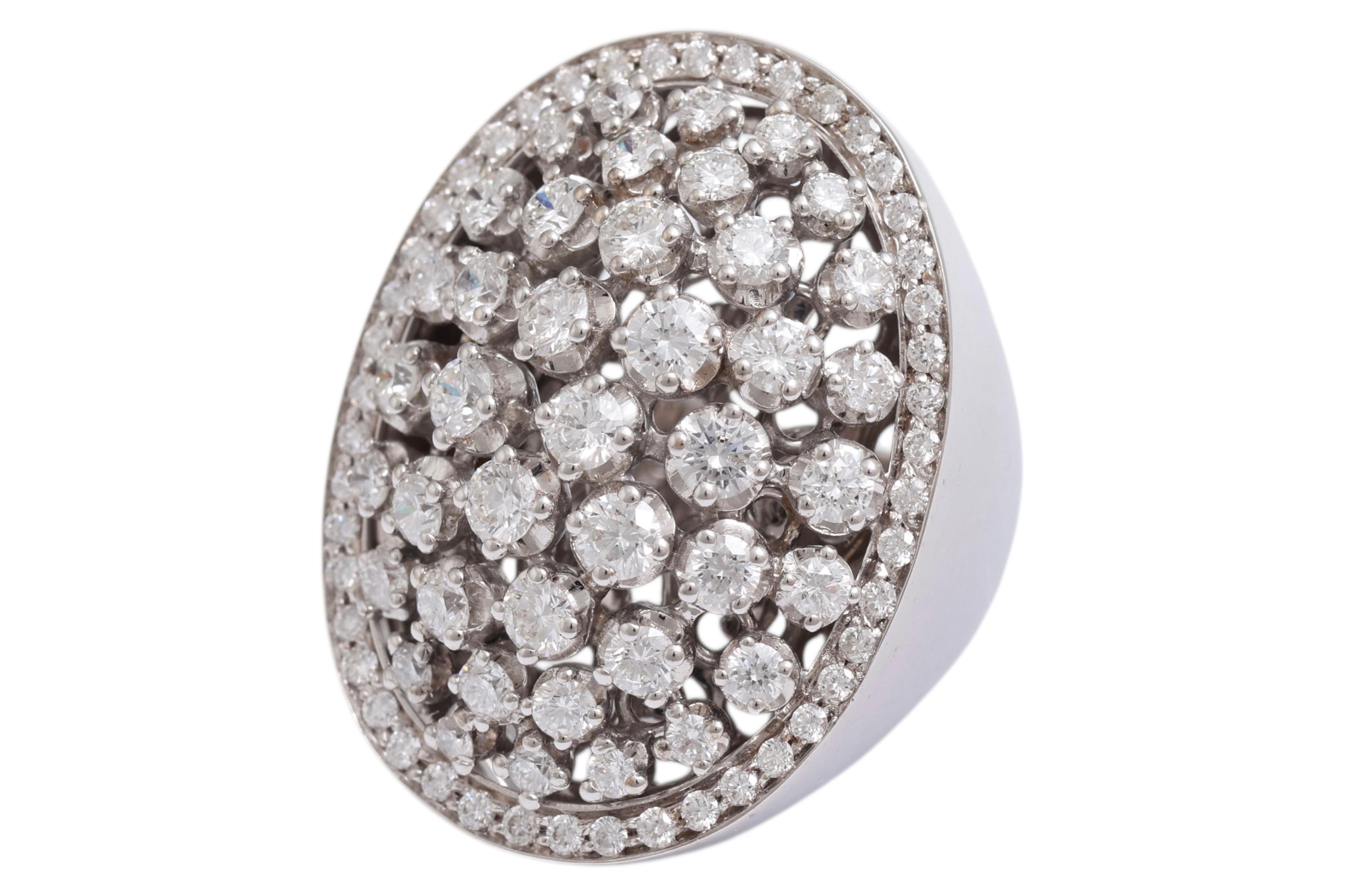 AMAZING OVAL SHAPED 18 KT WHITE GOLDEN RING FULL WITH NATURAL EARTH MINED DIAMONDS

MATERIAL: 18 kt white gold

DIAMONDS: brilliant cut diamonds together  3.84 Cts  F/G VVS/VS

WEIGHT: 29.9 gr / 1.055 oz / 19.25 dwt

DIMENSIONS : Length 32.9 mm,