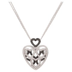  18 kt. White Gold Heart Necklace With 1 ct. White & Black Diamonds 