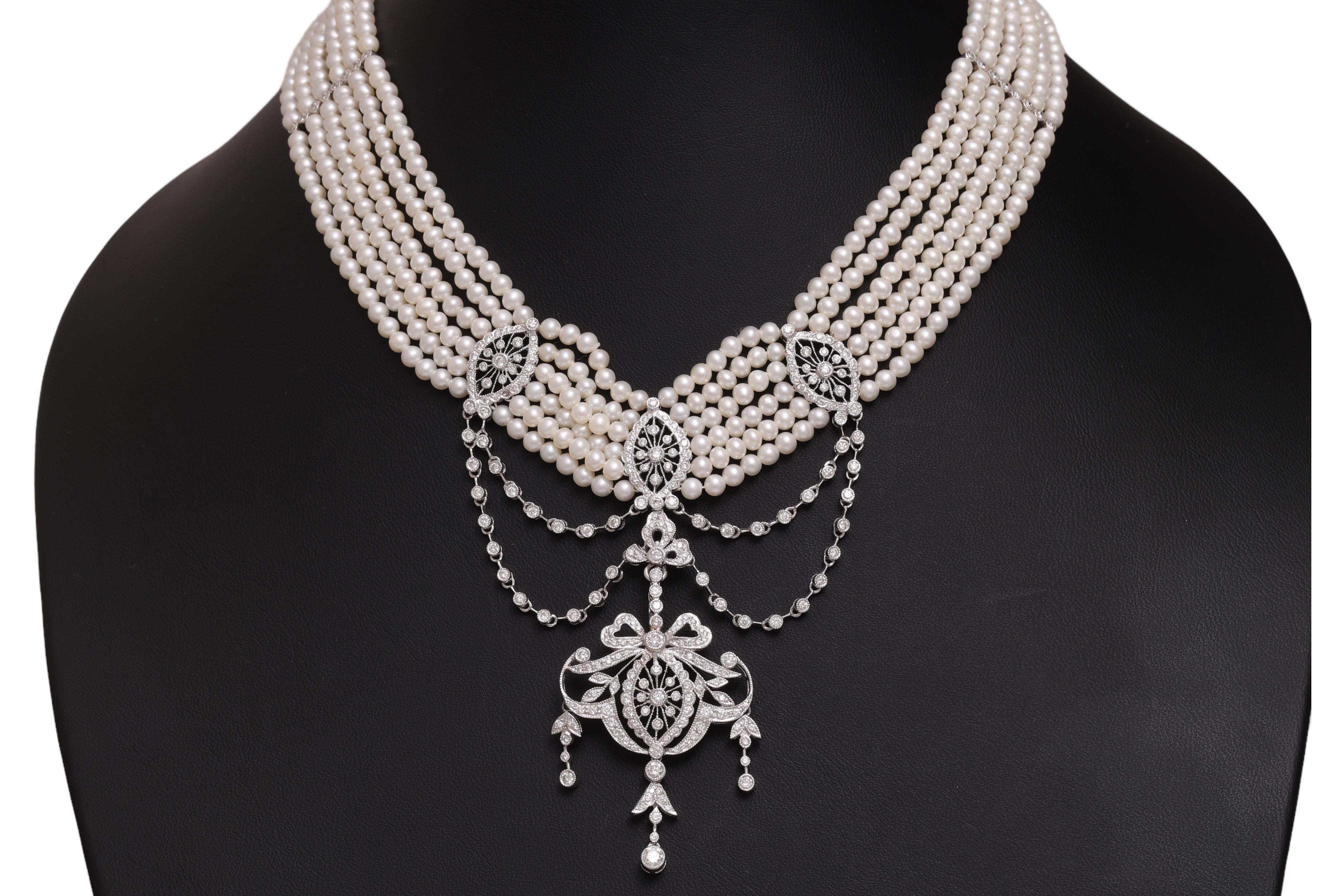 Magnificant 18 kt. White Gold Multi Strand, Fresh Water Pearl Choker Necklace With Diamonds, With option to take Chandelier pendant off to match the occasion or to give it another look. 

Pearls: 393 Fresh water pearls with a diameter of 3.2