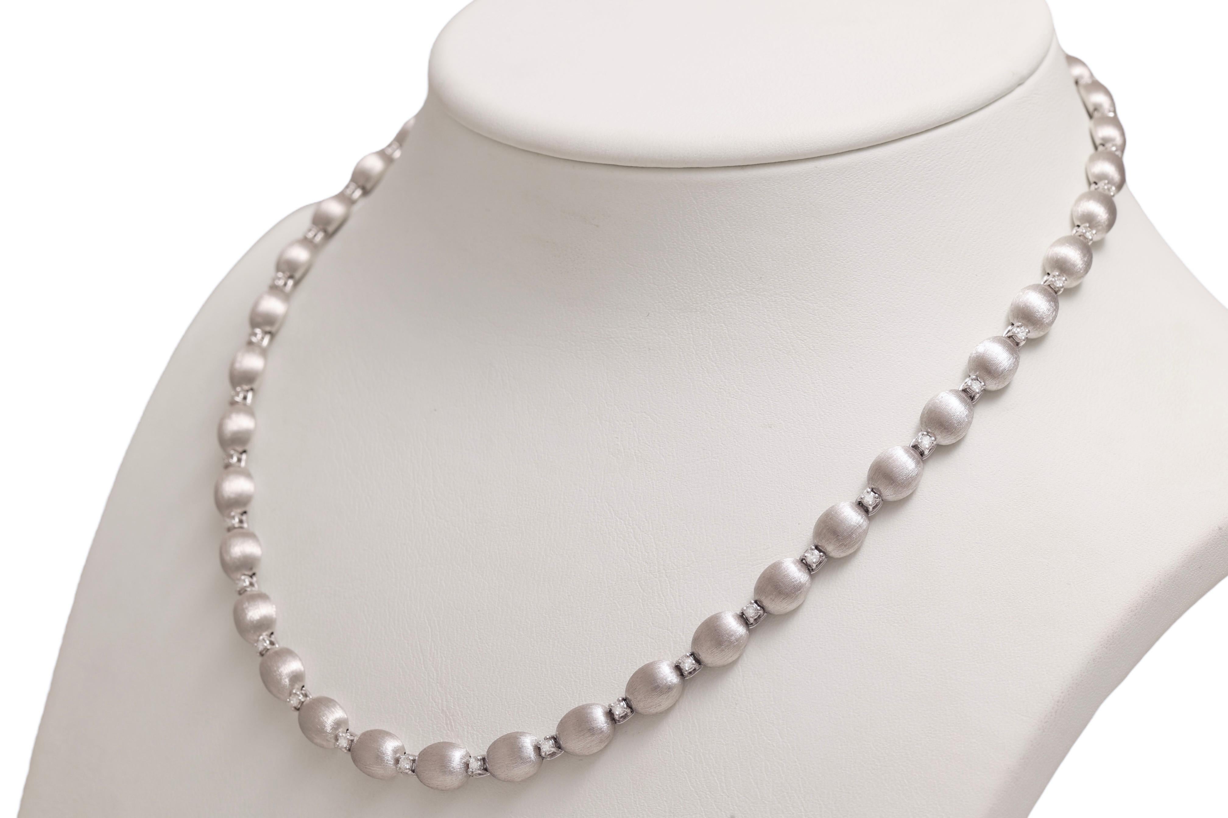 WHITE GOLDEN NANIS NECKLACE WITH DIAMONDS

MATERIAL: 18 kt white gold

DIAMONDS : 1.4 Ct

SIZE: 40 cm

WEIGHT: 21.863000 grams / 14 dwt / 0.770 oz