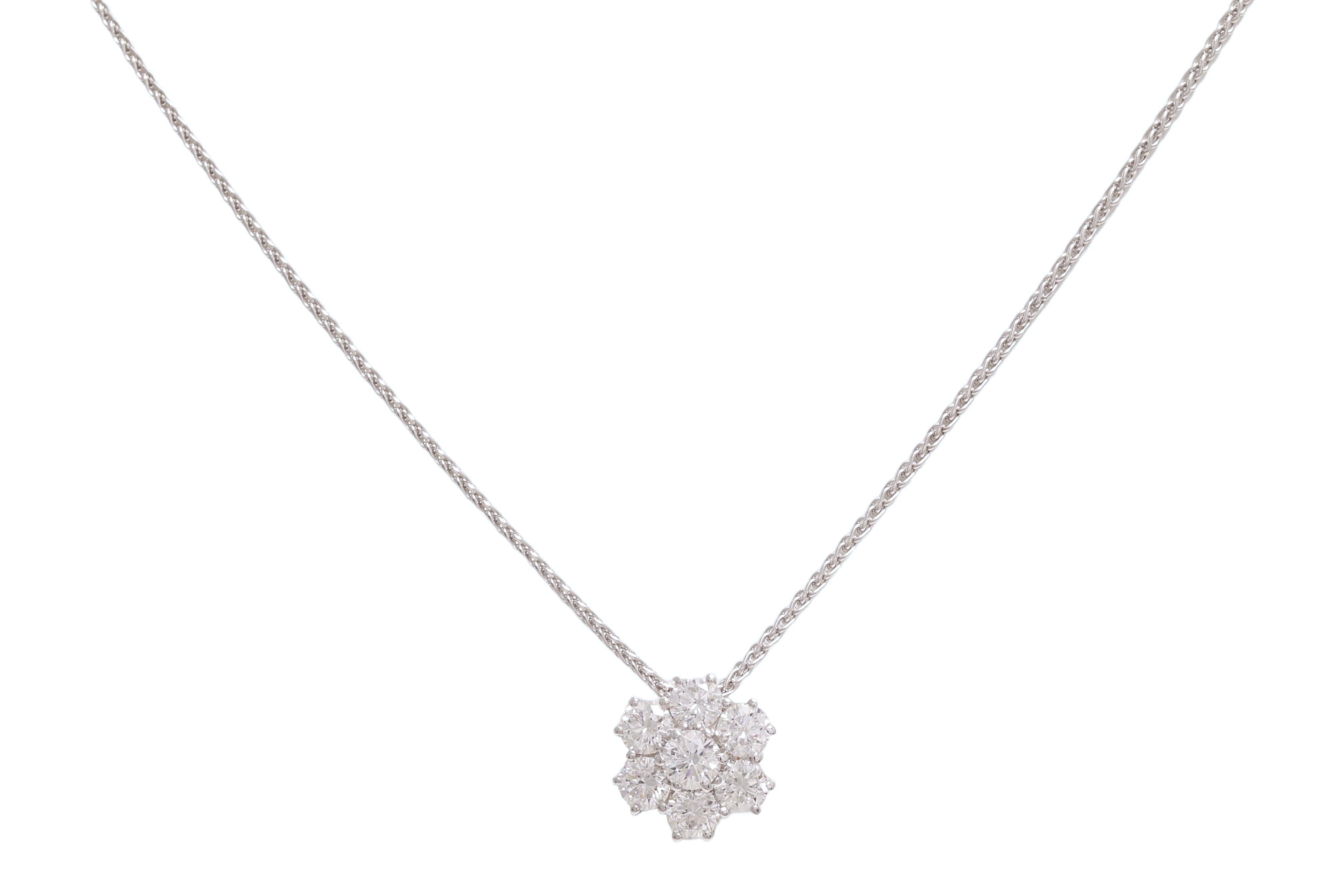 Timeless yet Gorgeous 18 kt. White Gold Necklace Pendant with 1.13 ct. Diamonds 

Diamonds: 7 brilliant cut diamonds together 1.13 ct. F/G VS

Material: 18 kt white gold

Measurements: pendant diameter 10 mm
Necklace length: 42 cm with eye to  make