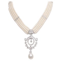 18 kt. Collier de perles en or blanc avec grande perle des mers du Sud et diamants 