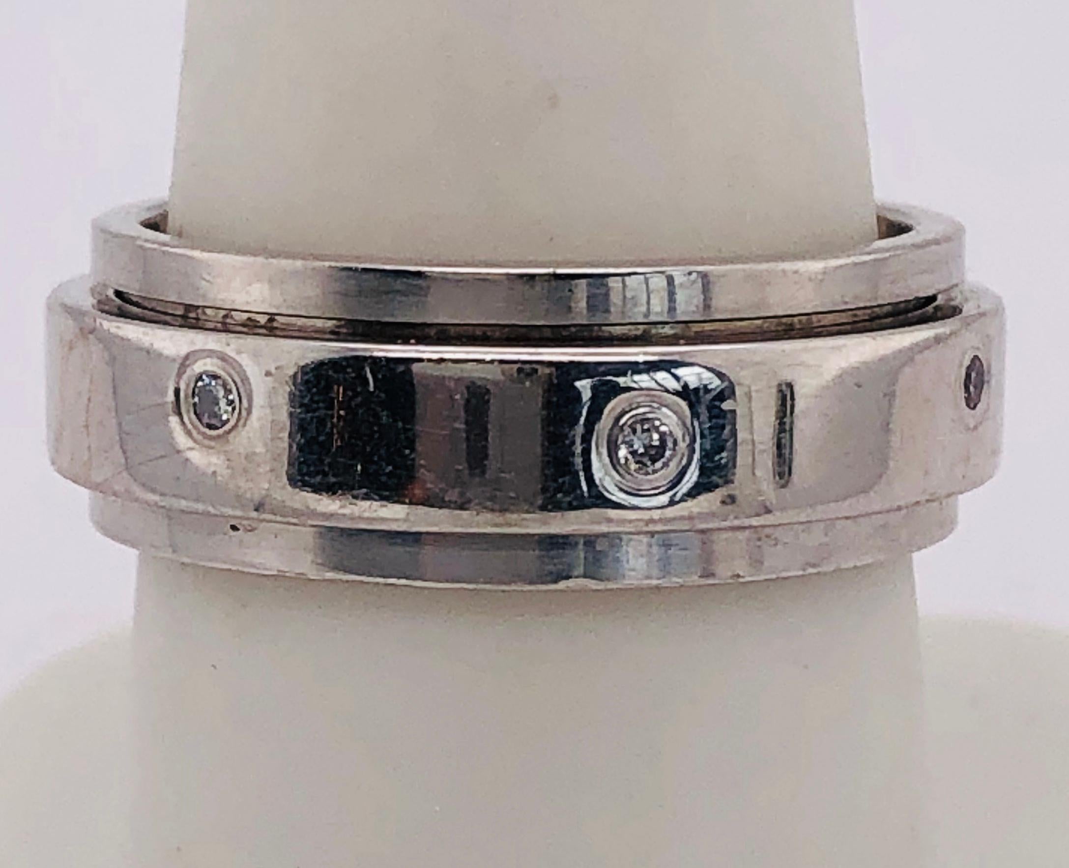 18 Kt White Gold Luxury Piaget Wedding Ring with Diamonds
Size 8 with 9.9 grams total weight.
In 1874, at the age of nineteen, Georges-Édouard Piaget set up his first workshop on the family farm where he devoted himself to the manufacture of