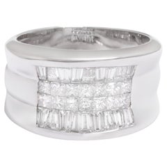 Anello in oro bianco 18 Kt con diamanti Princess e Baguette affusolati