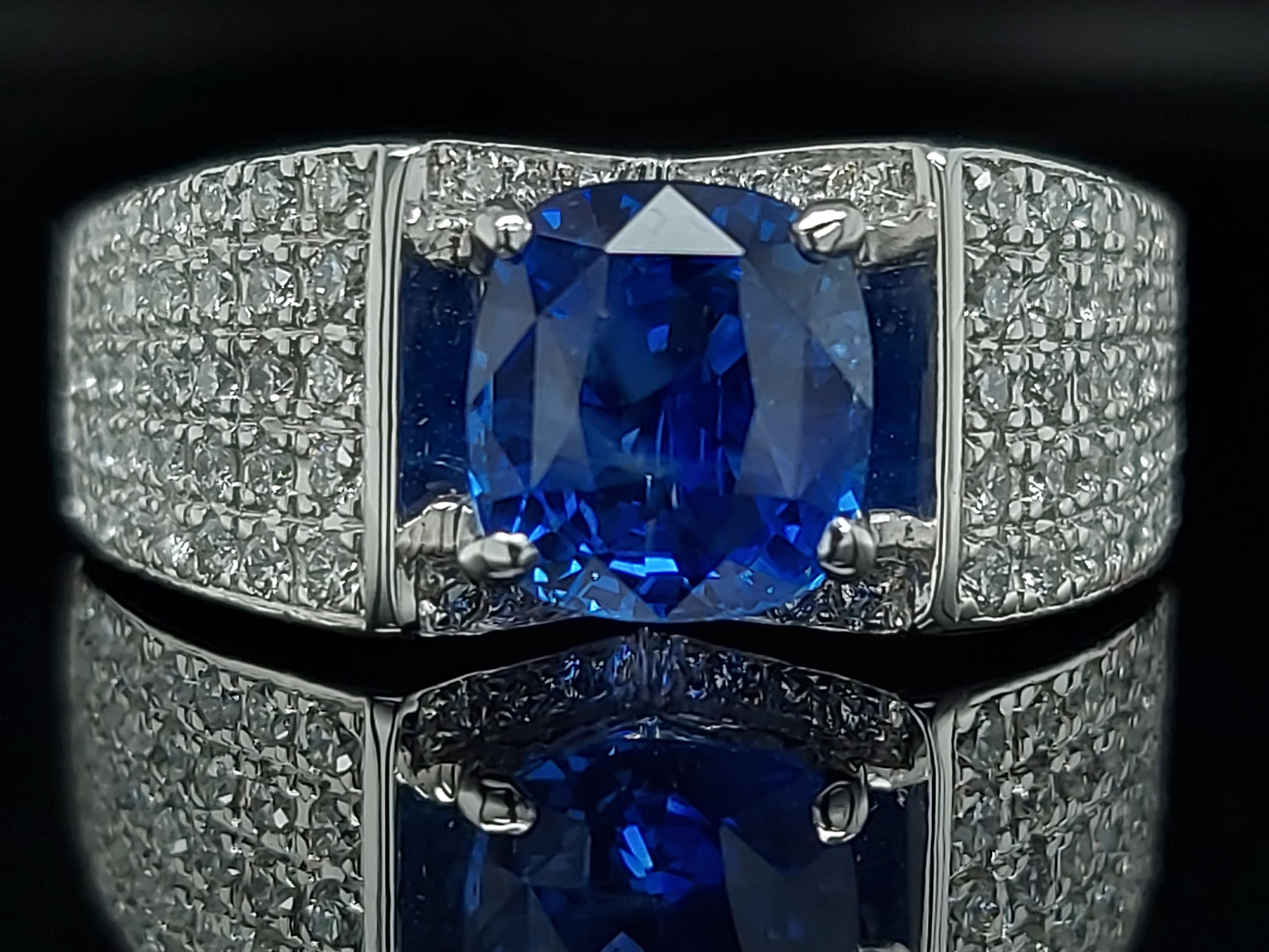 Magnificent 18 kt White Gold Ring With 92 Brilliant Cut Diamonds & 1 Sapphire 

Sapphire: 2,35 Ct Ceylon No Heat Sapphire 

Diamonds: 92 brilliant cut diamonds of Top quality

Material: 18 kt white gold

Total weight: 10.8 gram / 0.380 oz / 6.9