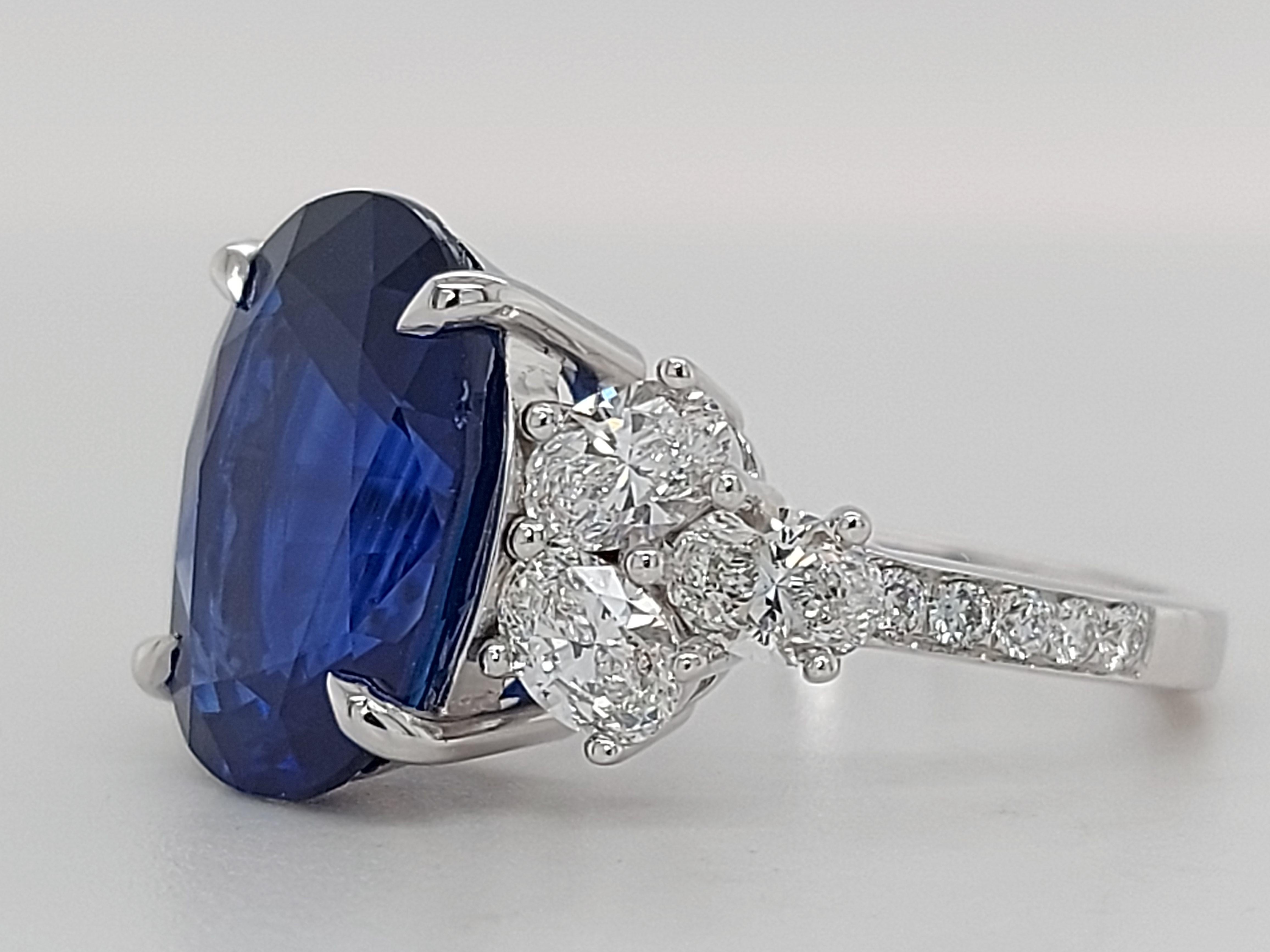 18 Karat White Gold Ring Set with a 7 Carat Sapphire and Diamonds 4