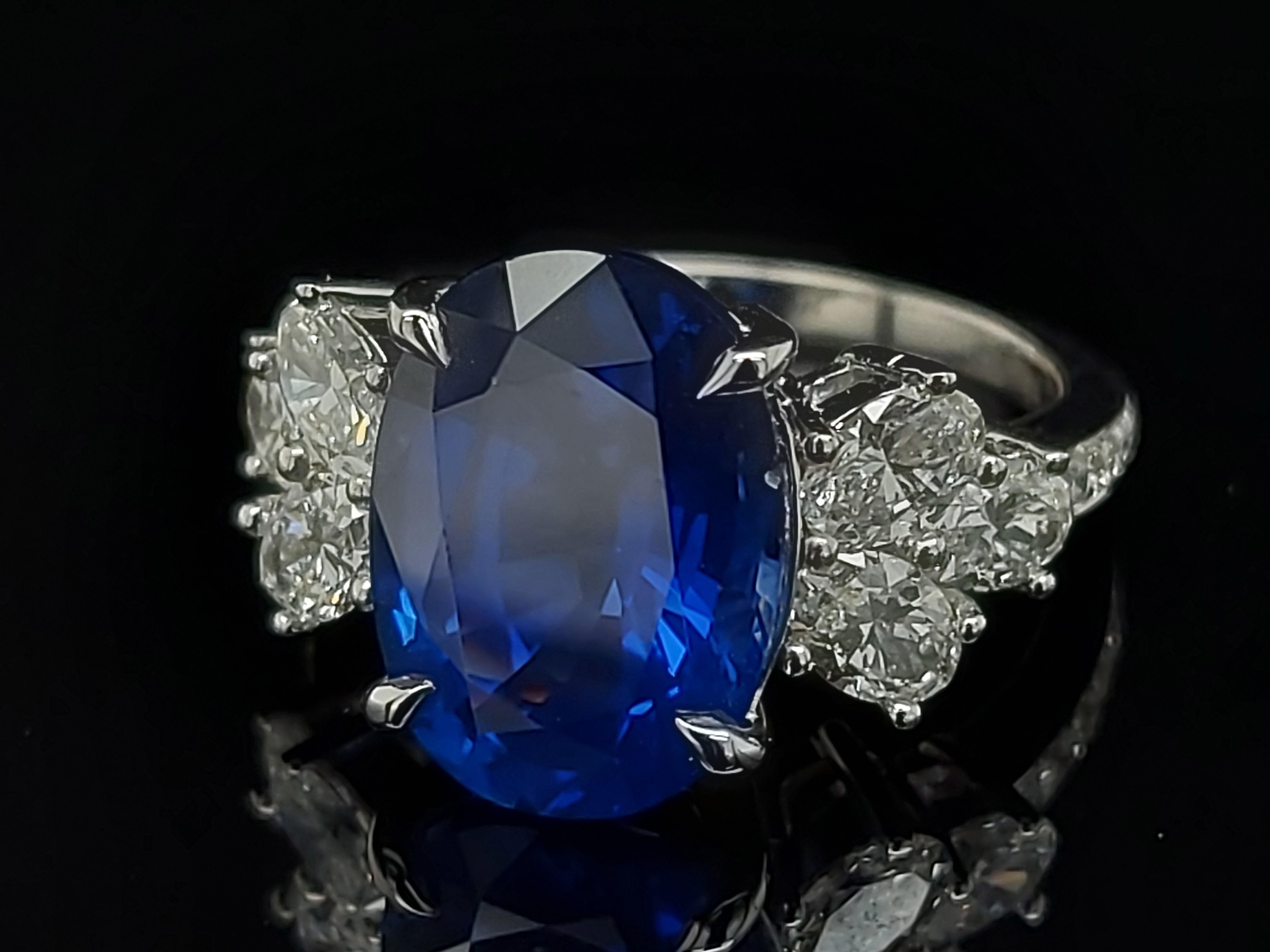 Brilliant Cut 18 Karat White Gold Ring Set with a 7 Carat Sapphire and Diamonds