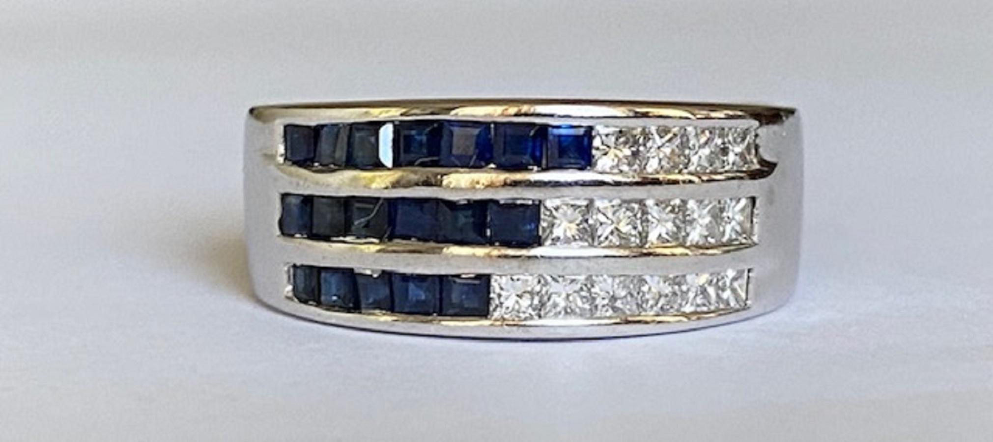 Offered in good condition, 18-karat white gold band ring, decorated with 15 princess cut diamonds of approx. 0.30 ct in total, G/VS and 18 'carré' (square) cut sapphires of approx. 0.40 ct in total.
Gold grade: 18 kt (marked)
15 princess cut