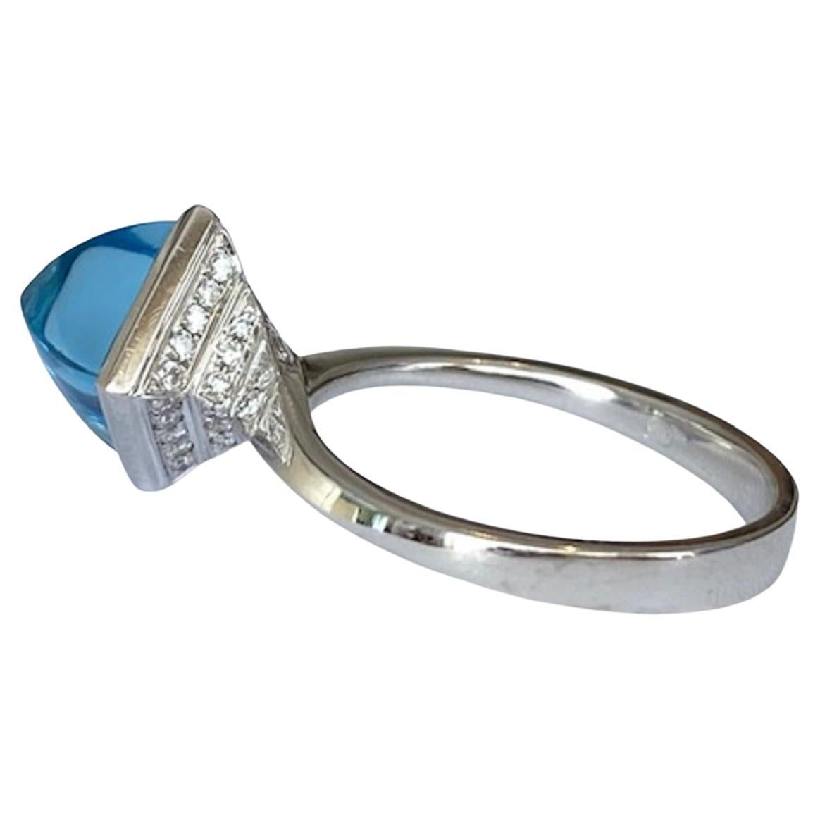 18 Kt. Bague en or blanc avec topaze de 3 carats et diamants