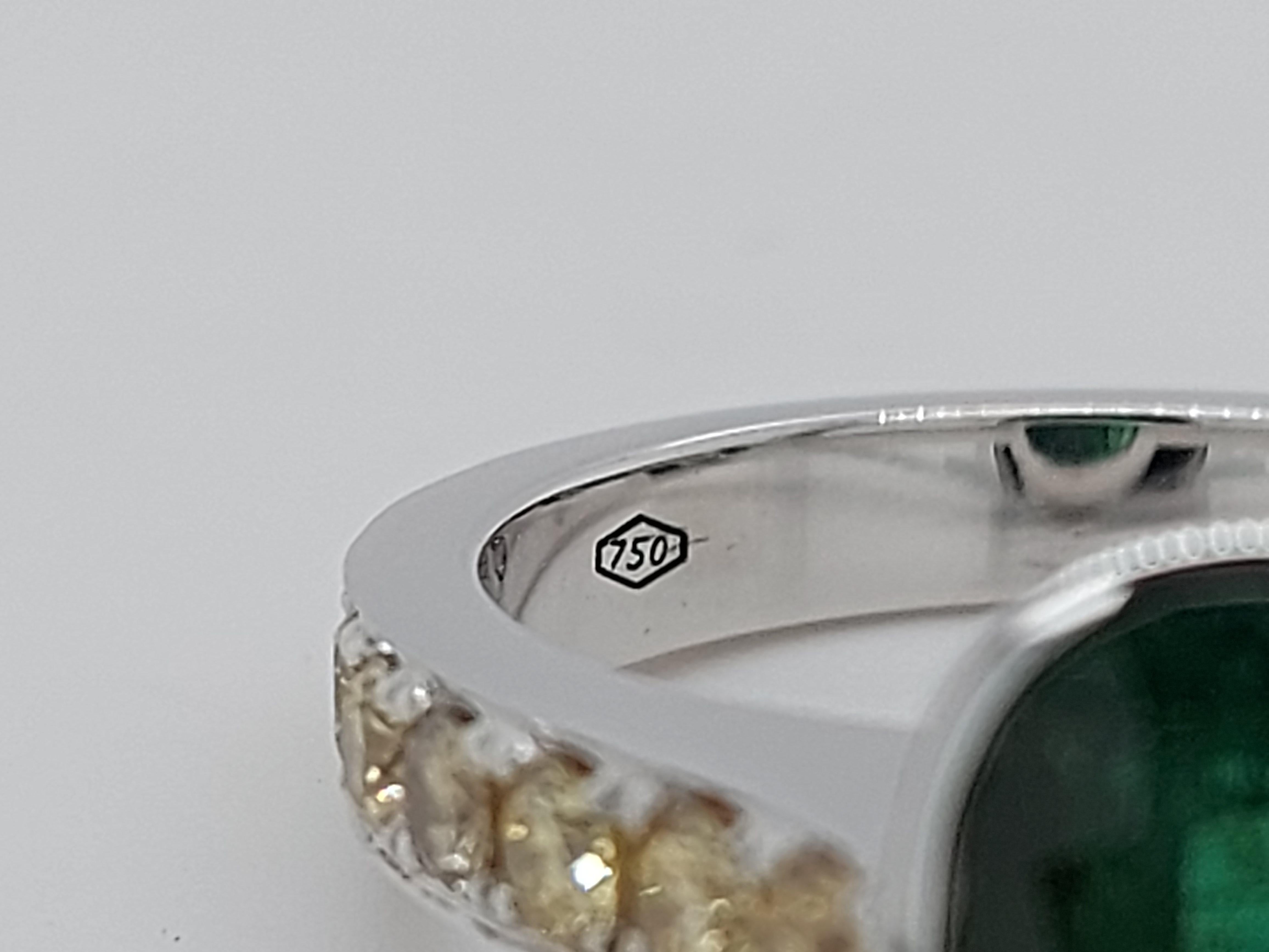 18 Karat White Gold Ring with 3.15 Carat Emerald and Fancy Yellow Diamonds For Sale 6