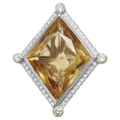 Anillo de Oro Blanco de 18 Kt con Citrino Grande y Diamantes