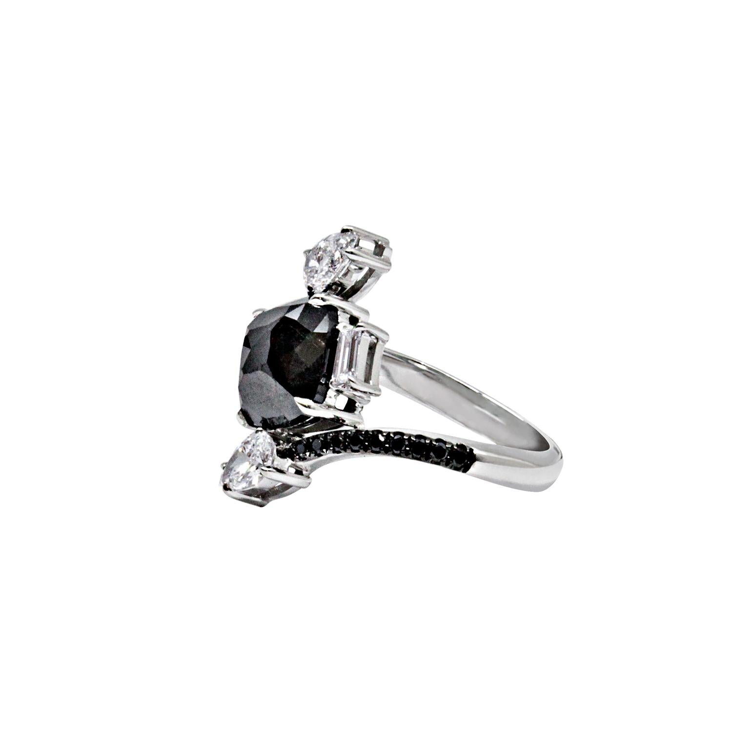 Break the rules in style with black diamonds!  Alluring and sensual jewelry creations handcrafted in 18 carat gold with black and white diamonds.
One PONIROS cocktail ring handcrafted in 18 carat white gold set with White and Black Diamonds.