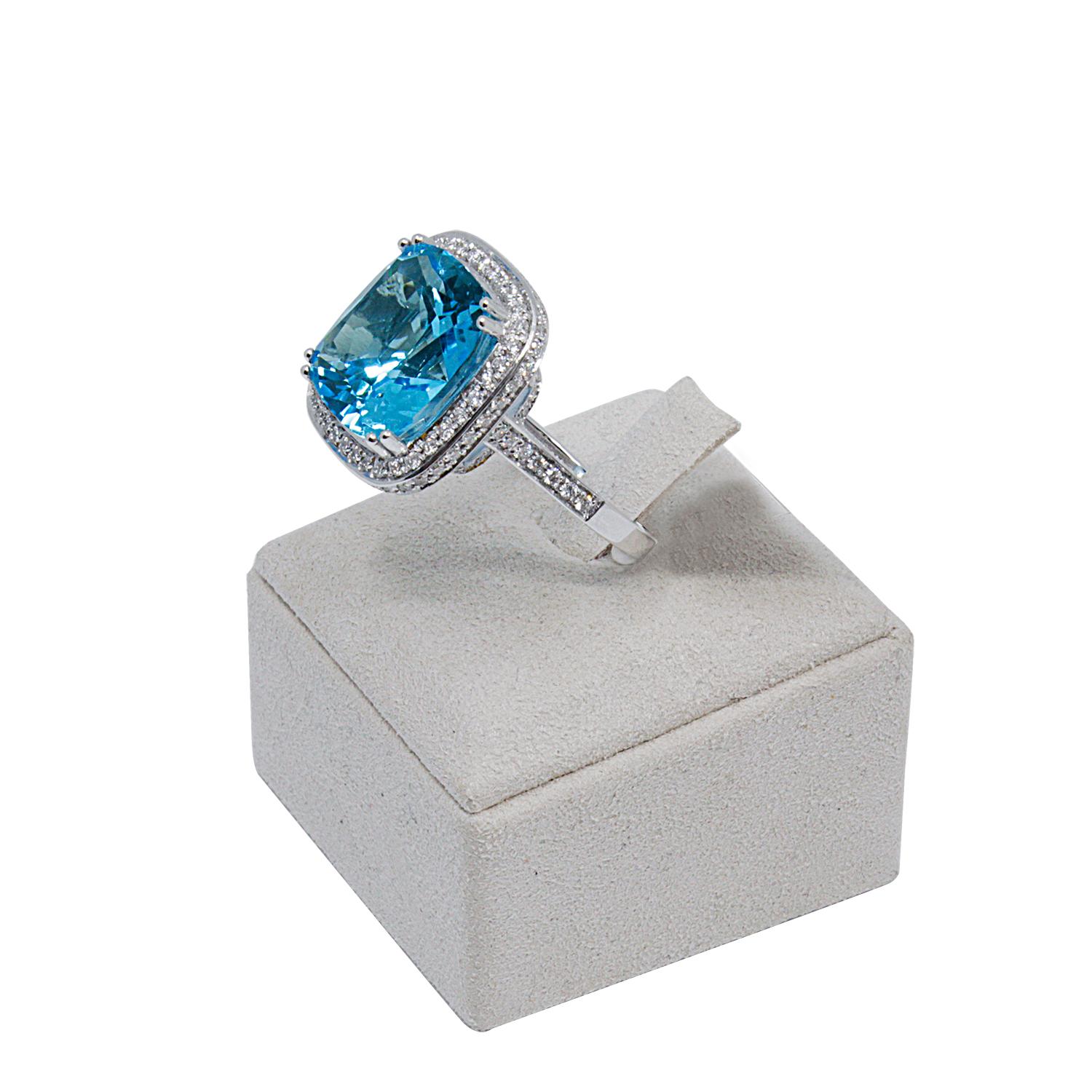 A rhapsody in blue! Gorgeously handcrafted in 18 carat gold this collection is set with a dazzling blue topaz and blue and white diamonds.. 
Description of Gemstones –
White Brilliant Cut Diamonds, total carat weight – 1,05ct ‘F’ Colour ‘VVS1’