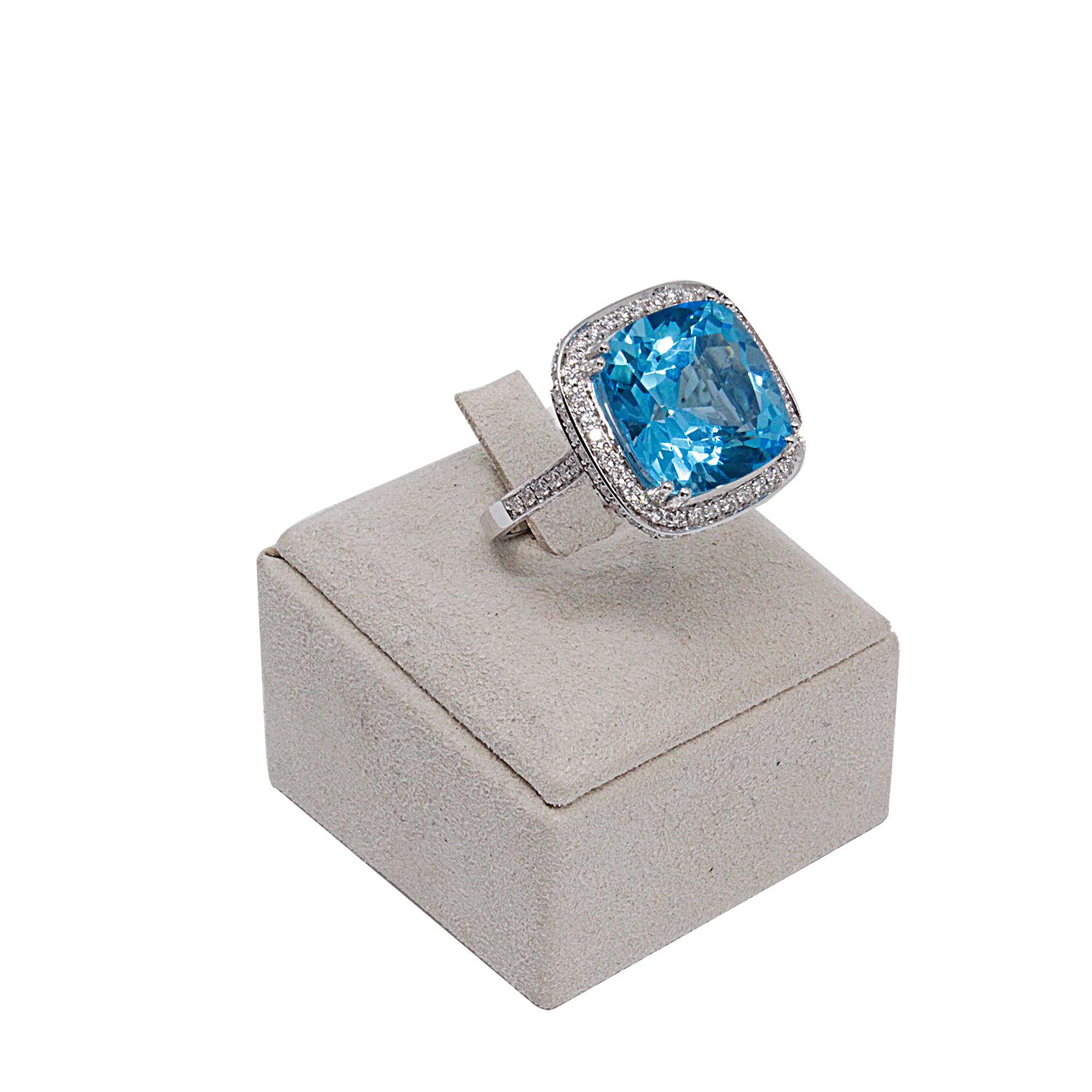 Modern 18 Karat White Gold Ring with White and Blue Diamonds and Topaz For Sale