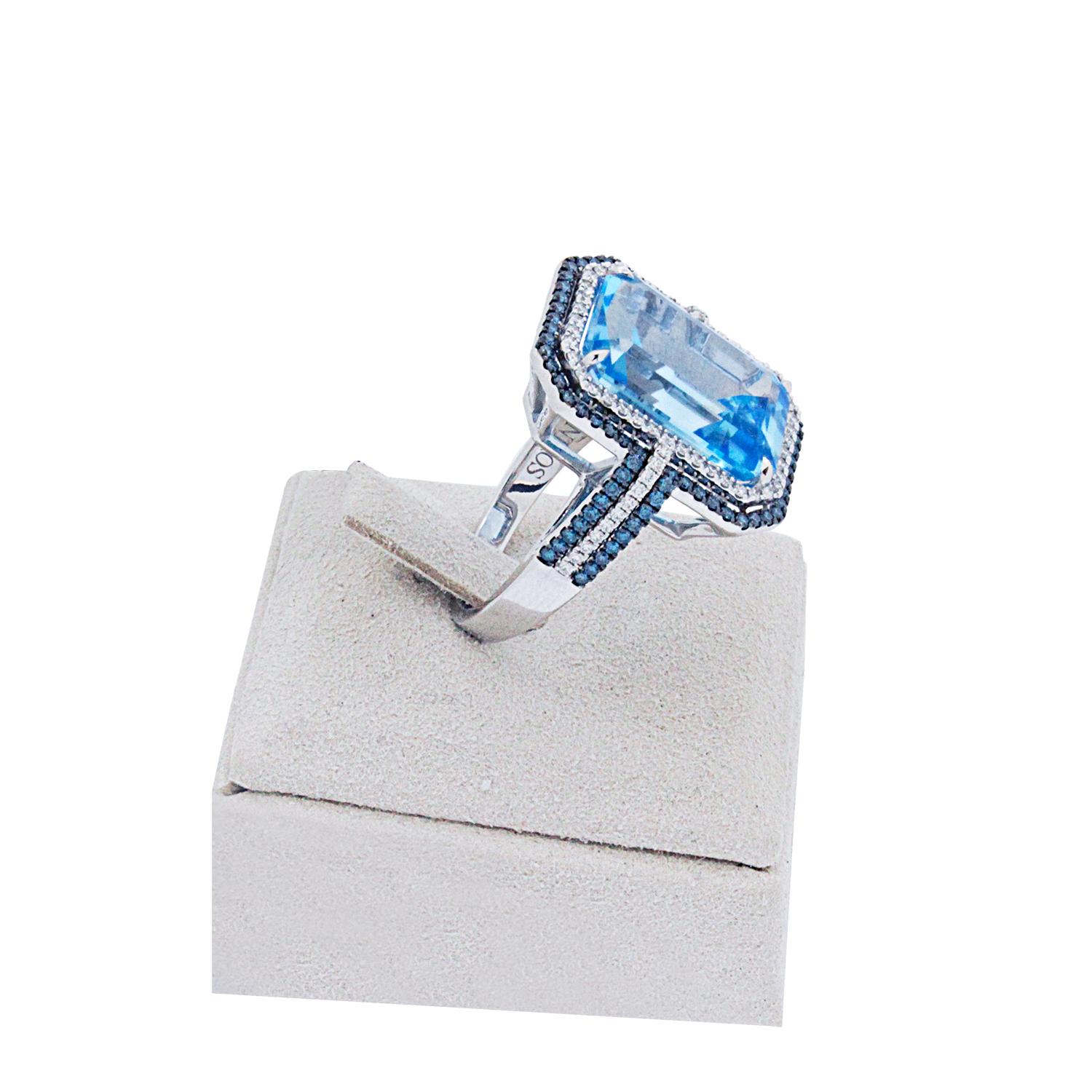 Cushion Cut 18 Karat White Gold Ring with White and Blue Diamonds and Topaz For Sale