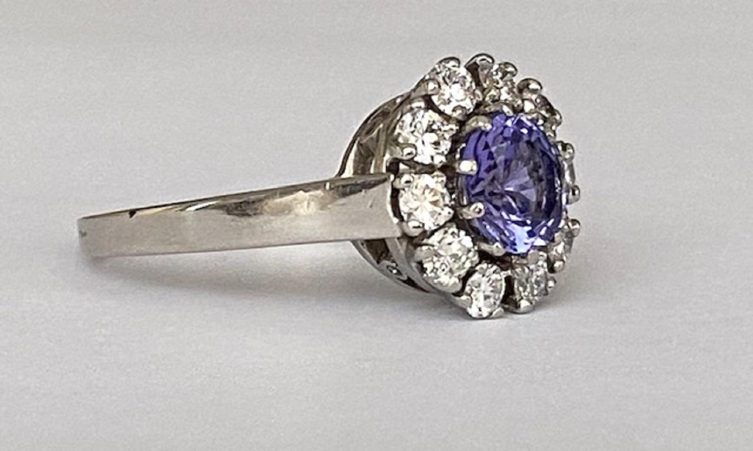 Women's 18 Kt. White Gold Rosette Diamonds Ring with 0.90 Ct Tanzanite  For Sale